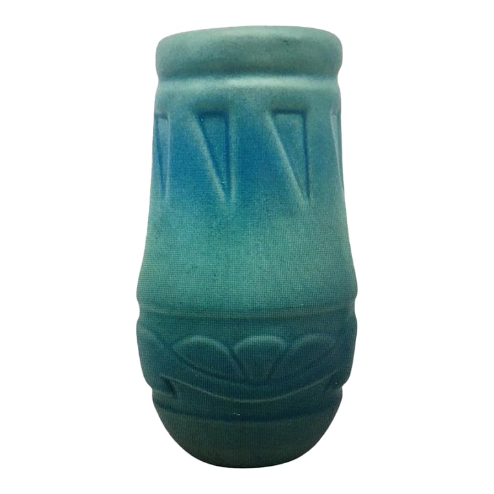 Van Briggle American Art Pottery Vase 20thc: Classic Van Briggle vase circa 1980's or thereabouts. It' has a chic presence with a dreamy glaze with a lovely variation in coloring from dusty cobalt to teal turquoise. The surface has indentations