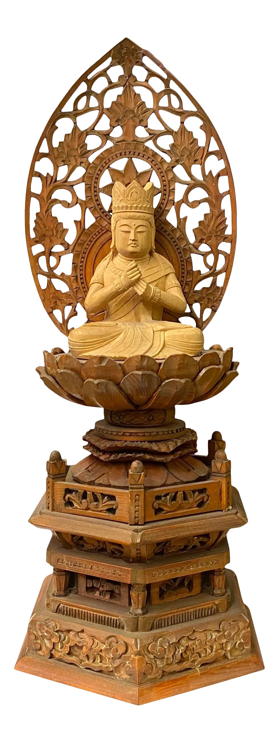 Chinese Sandal Wood Lotus Base Kwan Yin Bodhisattva Statue: This is a wooden Kwan Yin Bodhisattva Buddha statue carved from sandalwood with original wood color. The lotus base pedestal and the ornamental carved back panel enhance the serenity of the statue.