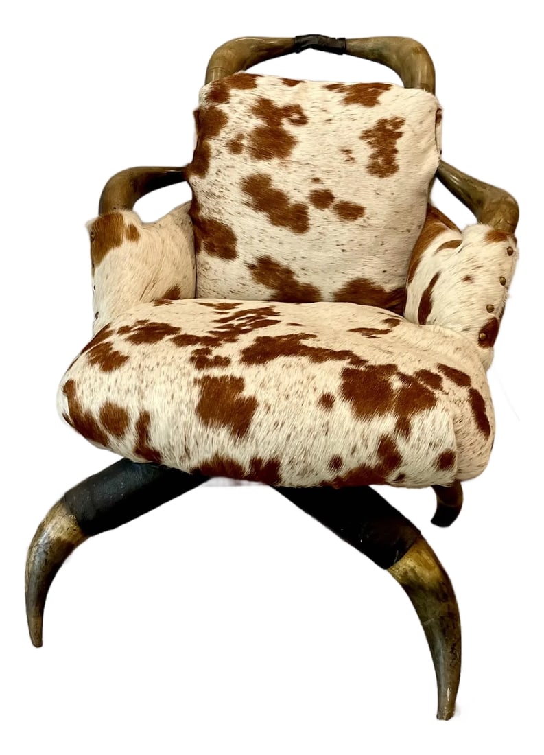 Antique Victorian Texas Long Horn Slipper Chair: Add a touch of Texas charm with this newly upholstered slipper chair. All original parts except the new cowhide. Chair still holds up beautifully today. Chair is only 24" tall, seat depth is 17", and