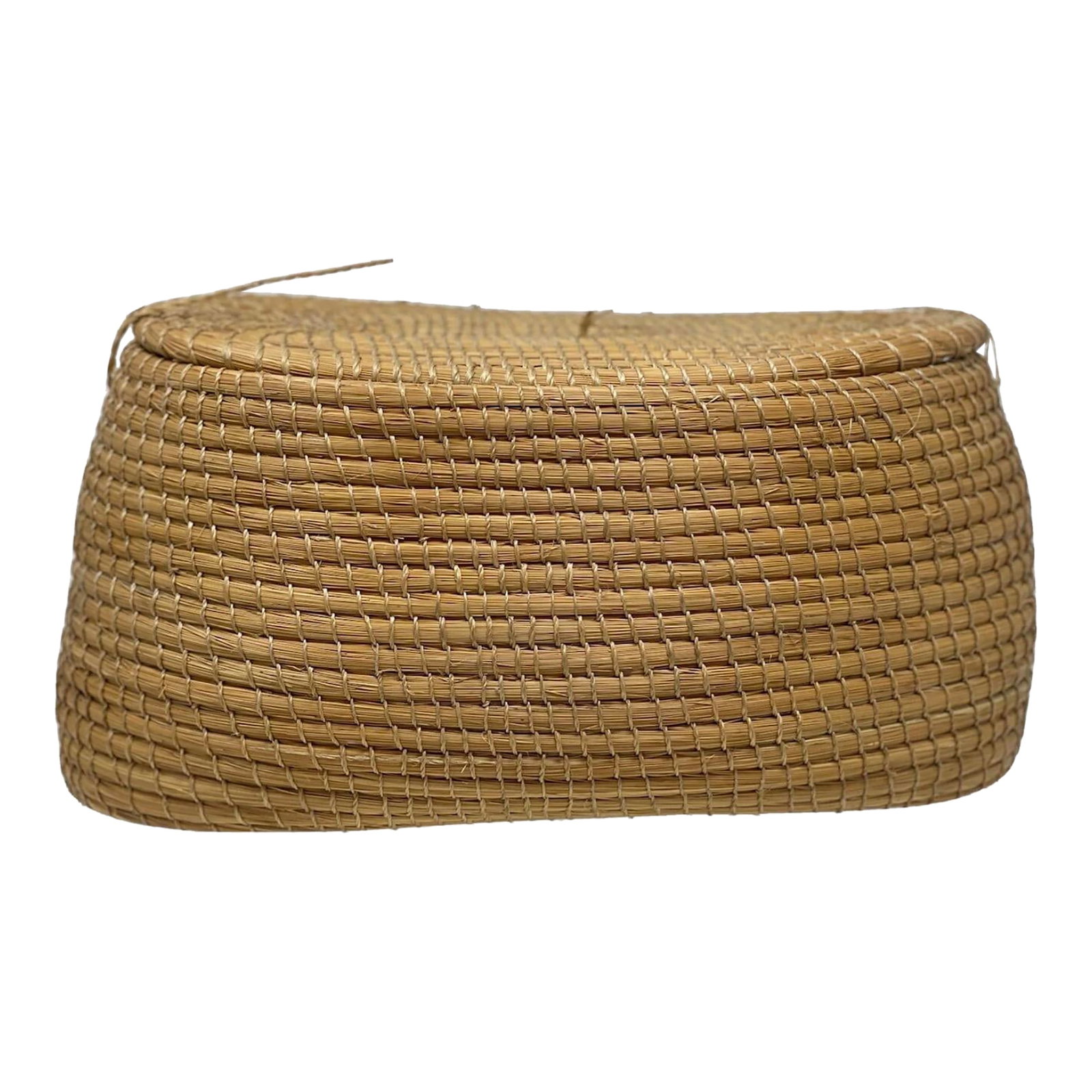 1980s Golden Grass Brazilian Lidded Basket: This golden grass only grows in the Jalapao region of Brazil and is protected by the government. The craft is a heritage of the Xerente indigenous group and usually involves a different style of