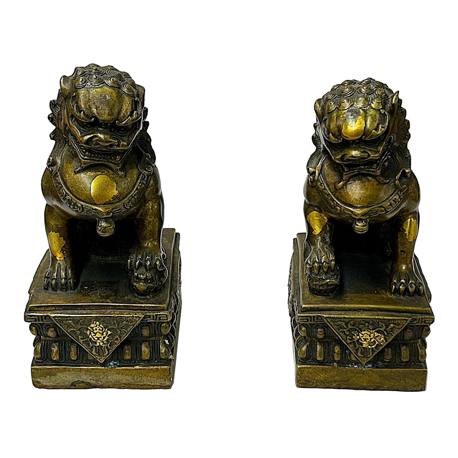 Pair Vintage Copper Color Metal Rustic Fengshui Foo Dog Lions Figures: This pair of ornate Chinese Guardian Lion statues, commonly known as Foo Dogs, is cast in a heavy, dark-patinated bronze with elegant gold-leaf accents. Each lion is perched regally atop a traditional