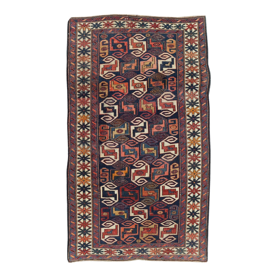 Galerie Shabab Collection Early 20th Century Caucasian Kuba Throw Rug: This early 20th century Caucasian Kuba rug, measuring 3' 5" x 5' 6", features a bold and dynamic composition emblematic of the Kuba weaving tradition. Set against a deep indigo field, the design is st