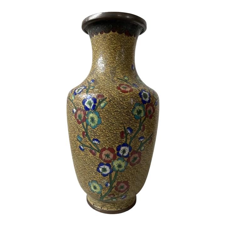 Early 20th Century Antique Chinese Cloisonne Vase: Stunning antique Chinese enamel and copper vase. This vase's unique design of small clouds and floral accents on a stunning muted mustard yellow. The cloisonné detail at the mouth of the vase is