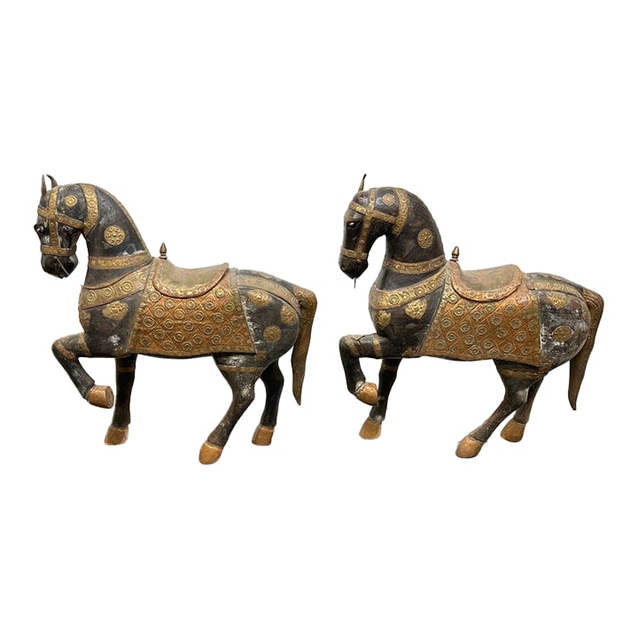 Pair of Antique Hand Carved Marwari War Horse Sculptures Pair Indian Wood Brass Copper: Stunning pair of antique hand-carved Marwari war horse sculptures from India. Each stands approximately 26.25 inches tall, crafted from solid wood with intricate brass and copper detailing on the sadd