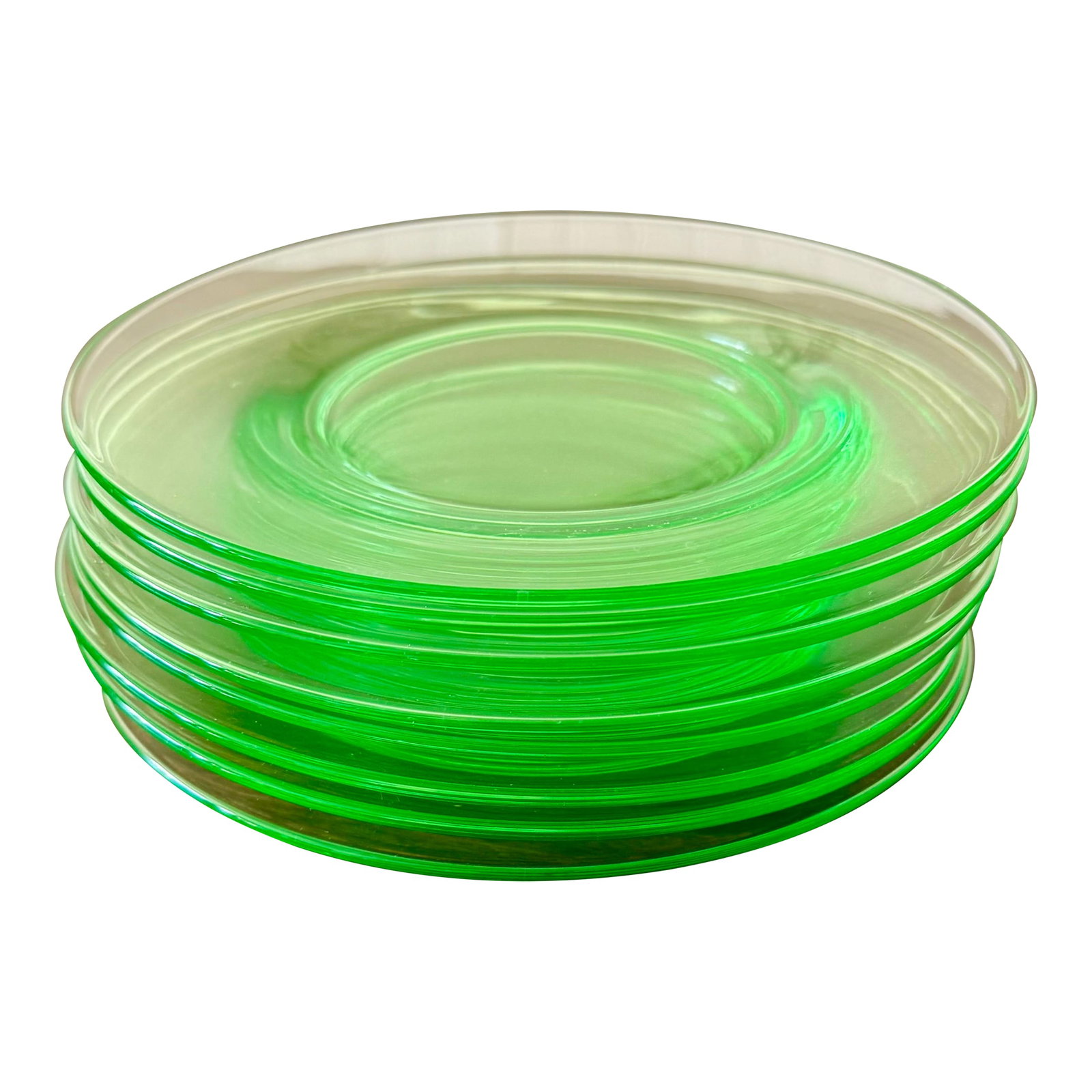 Fostoria Pioneer Vaseline Glass Salad Plates: These eight salad or dessert plates are translucent green glass plates, known as Uranium Glass or Vaseline Glass. Made by Fostoria and considered "Elegant Glass" meaning it was fire polished to