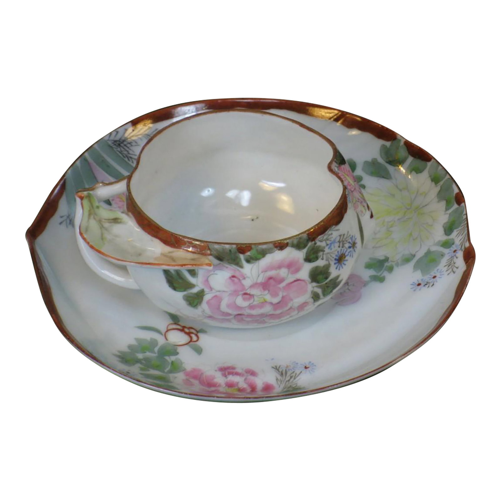 Late 19th Century Teacup Kyoto, Satsuma, Kutani Antique Hand Painted Japanese: Antique Japanese teacup set featuring a hand-painted design in multi-color. Made of porcelain and originating from Japan in the late 19th century, the set includes two pieces - a teacup and saucer. Th