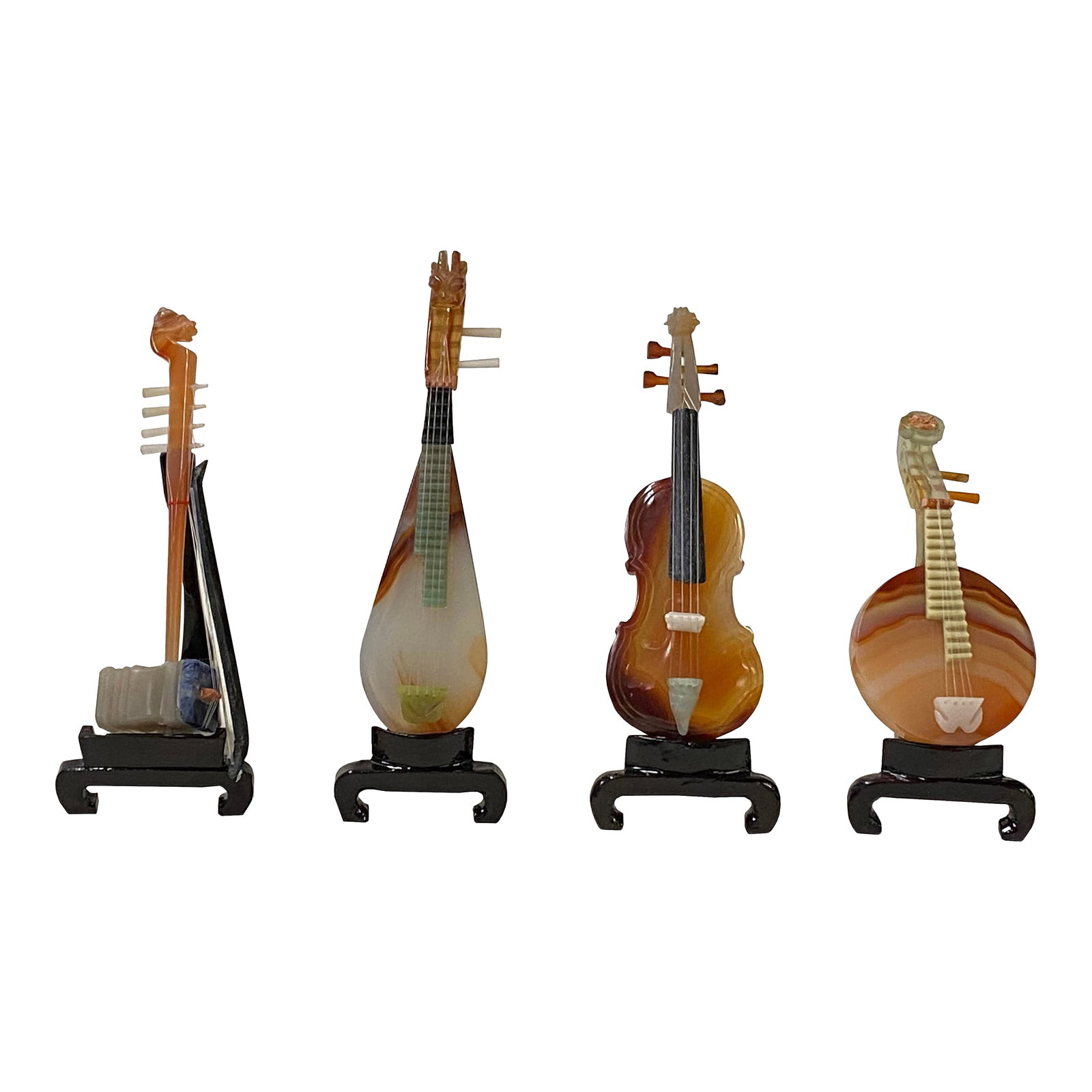 Set of 4 Color Stone Instruments Miniature Display Art Figures: This set of four miniature musical instruments showcases the artistry of finely carved agate, featuring a warm palette of amber, cream, and russet tones. Each piece is a meticulous homage to both East