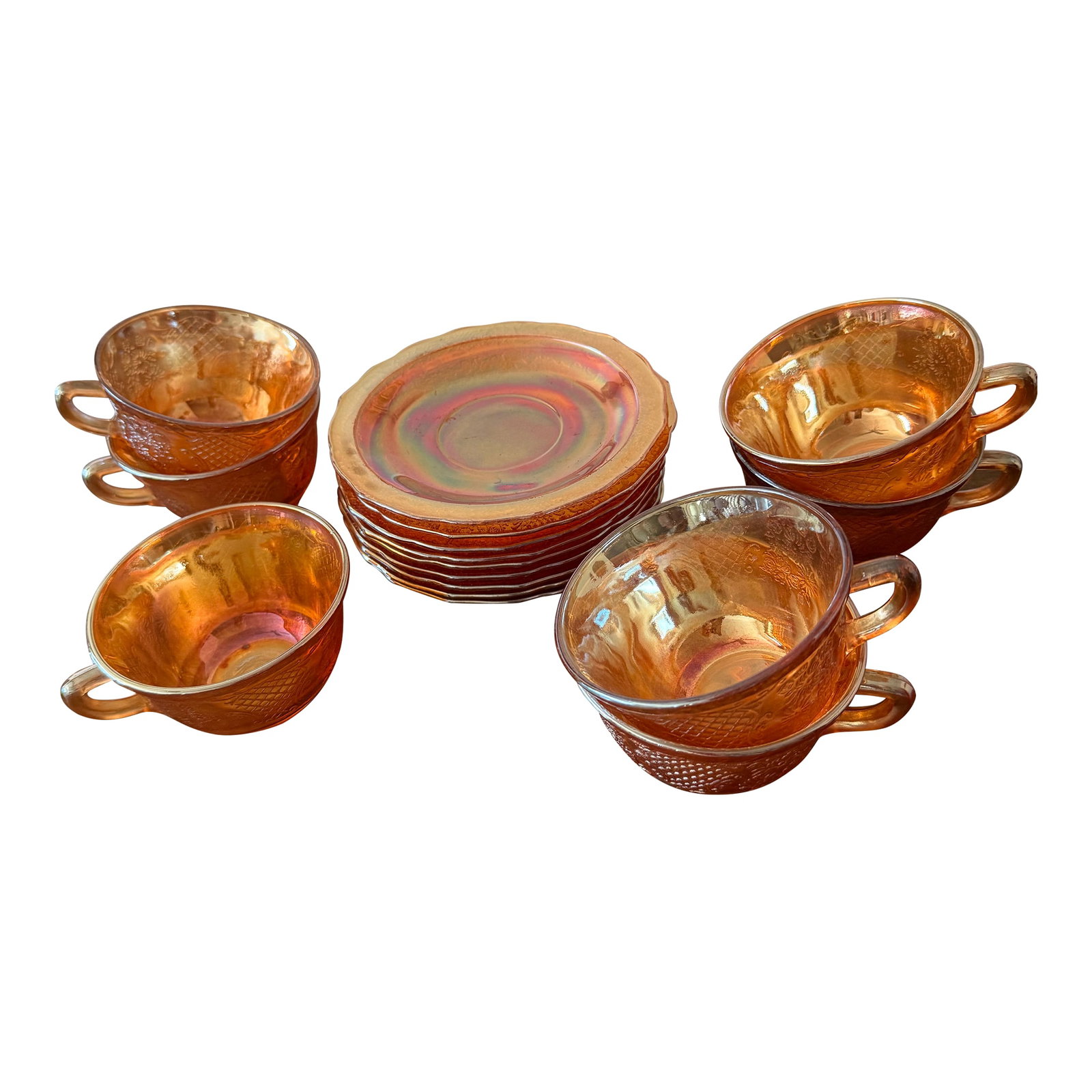 Federal Glass Normandie Bouquet Lattice Iridescent Depression Glassware Set - Set of 15: This collection of iridescent amber/marigold glassware from Federal Glass Company, featuring the Normandie Bouquet Lattice pattern is characteristic of depression glass produced in the 1930's. The gla