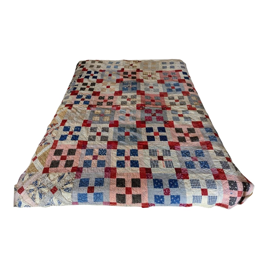 Hand-Stitched American Folk Art Nine Patch Pattern Quilt: The quilt exhibits characteristics of American folk art and likely dates to the late 19th century, though some fabrics may be older. At the time quilts of this sort were often constructed from