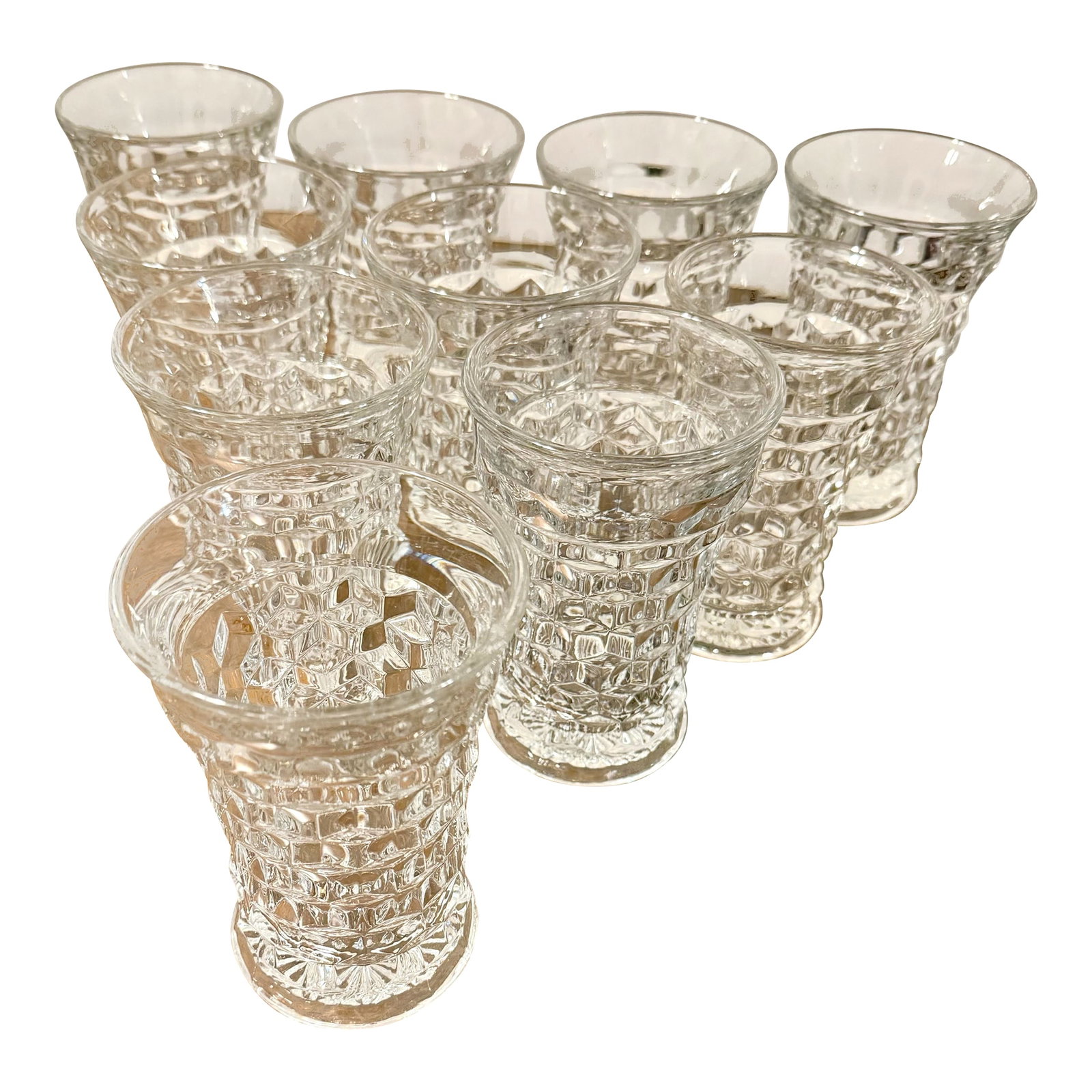 Fostoria 1930's American Flared Glass Set - 10pcs: This is a beautiful set of ten Fostoria American, 2065 pattern, flared rim glasses, known for their sturdy construction and classic aesthetic. The intricate geometric diamond point pattern is