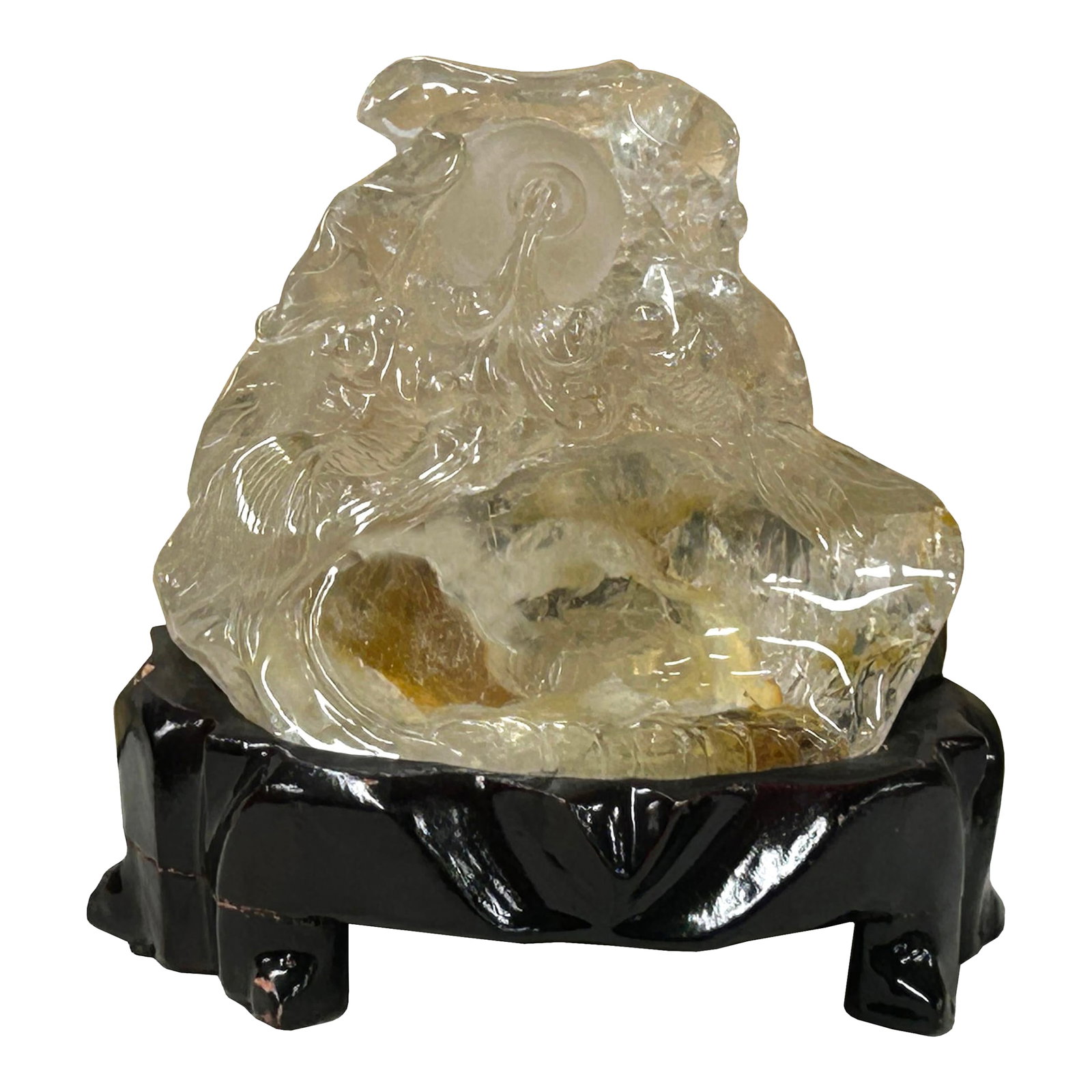 Natural Clear Crystal Koi Gold Fishes Wave Display on Wood Stand: This exquisite hand-carved rock crystal quartz sculpture showcases a masterful play of light and organic form. The piece features a central Bi-disk motif surrounded by ethereal, flowing clouds and