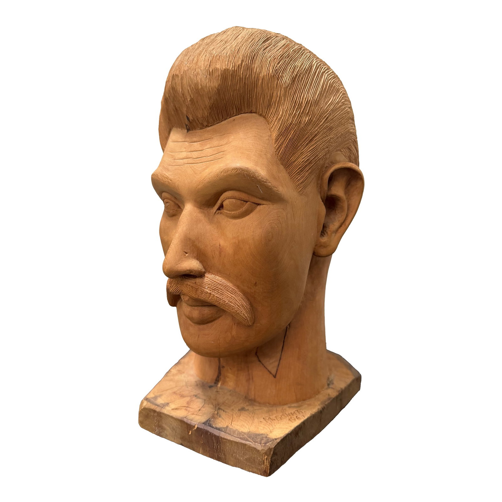 1960s Folk Art Americana Barbershop Carved Wood Bust of a Man: This 1960s folk art carving of a mustachioed man with a pompadour was used as a counter top display in a Detroit barber shop. It is signed on the surface of the base, and dated. It is 13"H.