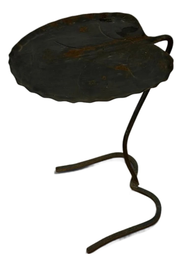 Vintage Black Salterini Lilly Pad Table: The epitome of old money style. This charming leaf shaped drink table will look fabulous on your porch or patio. It's designed by big name John Salterini, who designed luxury furniture in the 30's,