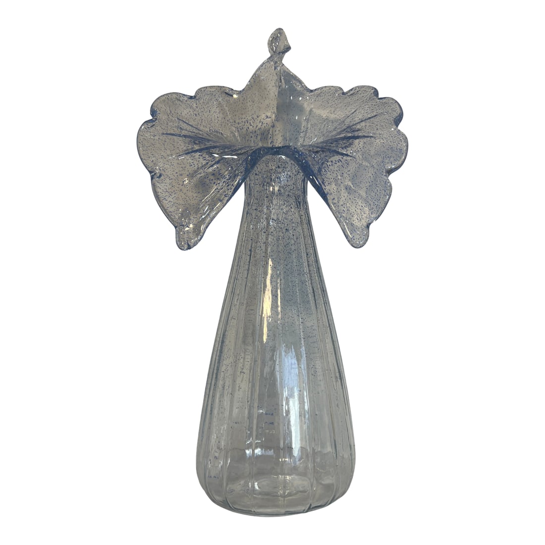 21 In. Tall Art Glass Clear Fluted Confetti Blue Speckled Flower Shaped Vase: This fluted art glass vase stands 21 inches tall and 10 inches wide, rising in a long, ribbed column that opens into a wide, flowing rim. The silhouette evokes the soft, sculptural curves of a calla
