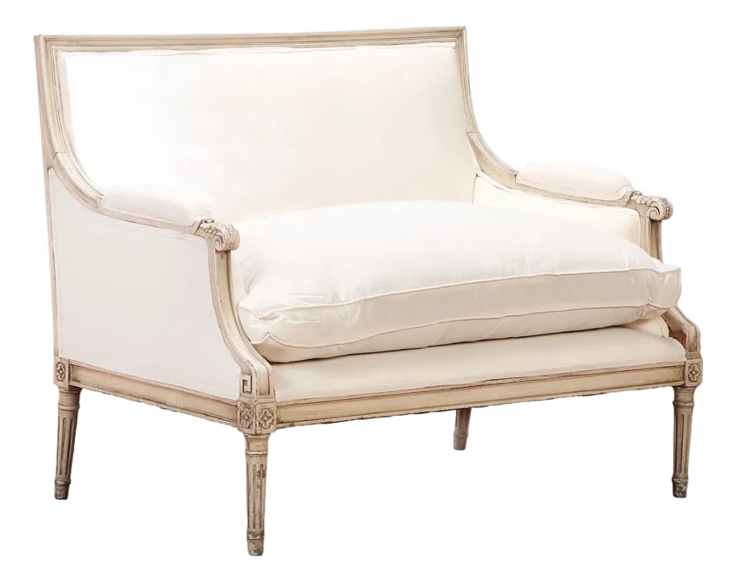 Louis XVI Style Painted Canapé Settee Attributed to Jansen | Ca. 1945: A sophisticated Louis XVI-style painted canapé attributed to the celebrated French design house Jansen, dating to approximately 1945. Elegantly proportioned and exceptionally versatile, the