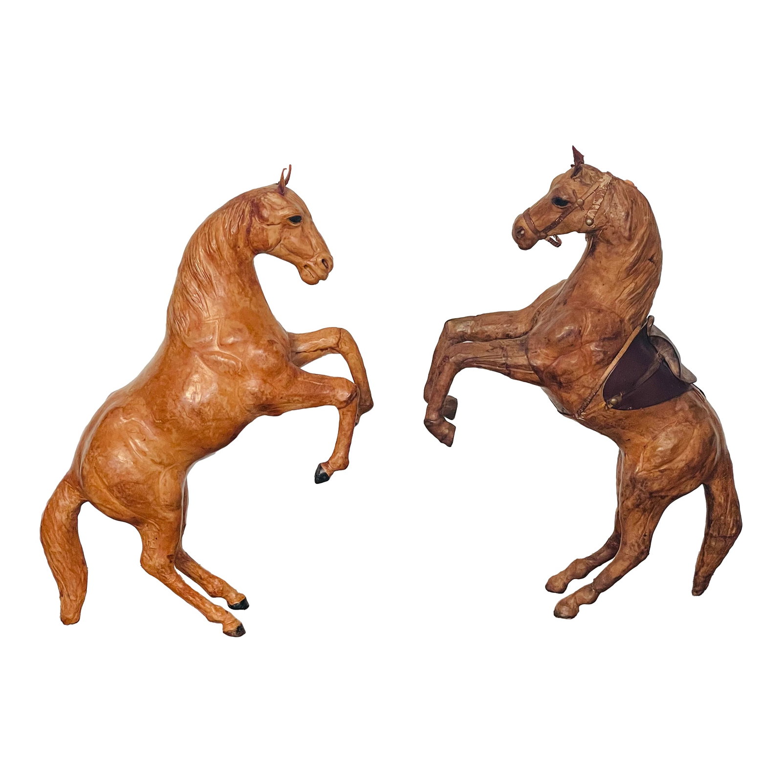 1950s Handsome Equestrian Pair of Leather Horse Sculptures: Handsome pair of leather bound horse sculptures, the darker one with more detailed work and glass eyes. Condition: Alterations: Original Condition Unaltered Imperfections: Some Imperfections Condition