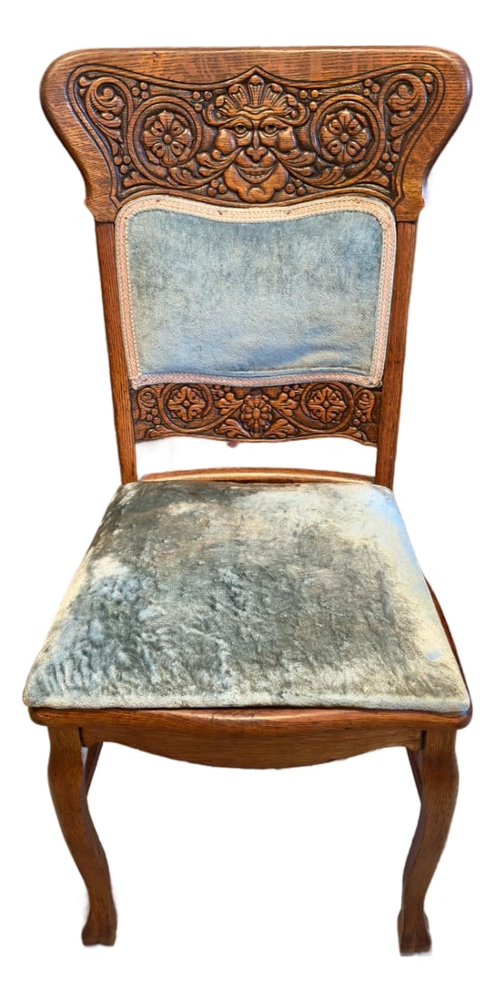 Mid 19th Century American Renaissance Revival "North Wind" Side Chair: Gorgeous piece. Solid quartersawn oak featuring an original pale blue crushed velvet upholstered seat and back insert. The top crest rail features a deeply hand-carved "Green Man" motif or "North