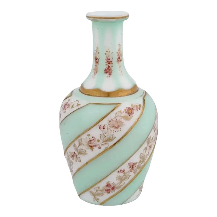 Antique Late 19th Century Bohemian Glass Gilt Cut Overlay Decanter: A vintage European, probably Czech, Bohemian glass cut overlay decanter. The ware is made in a panel design. The exterior of the decanter is adorned with hand painted floral and foliage motifs, and gi