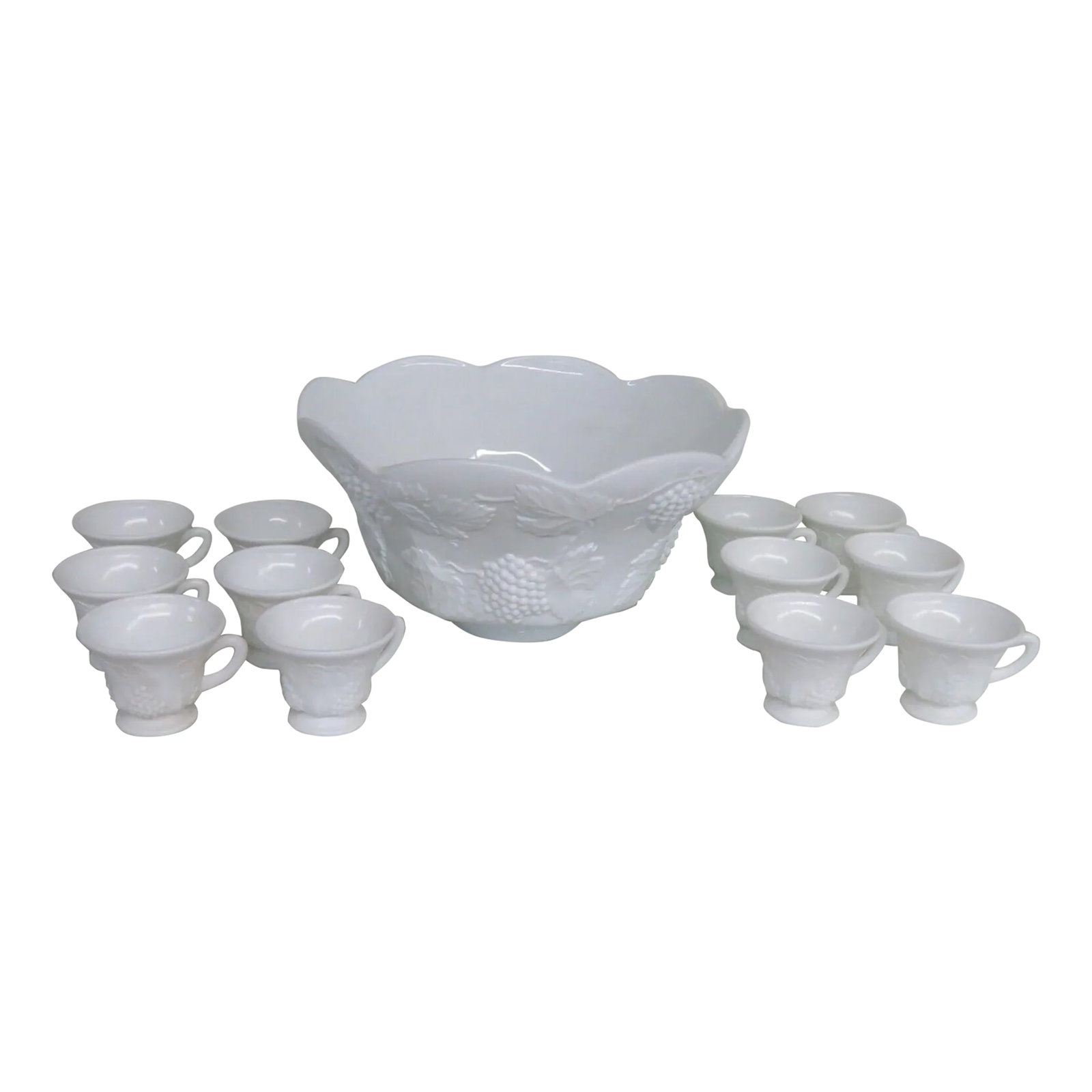 Indiana Style Harvest Grape White Milk Glass Punch Bowl and 12 Cups Set: This magnificent Set of a Punch Bowl and 12 Cups is made of milk glass. This set is made in a similar pattern to the Harvest Grape pattern used by Indiana Glass; it features a wonderful design of