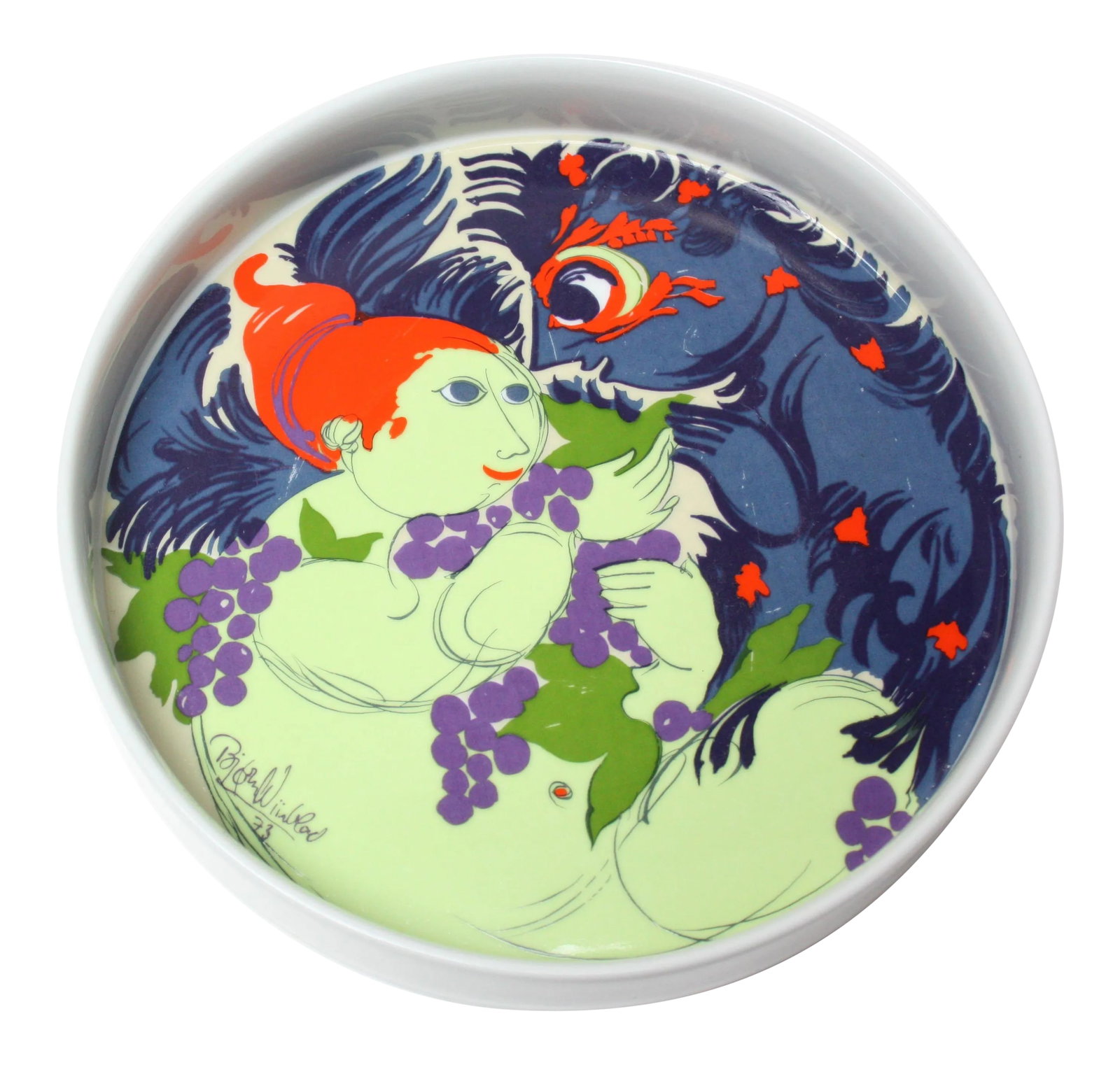 Danish Modern Bjorn Wiinblad for Rosenthal Charger / Serving Dish: Lovely example of Bjorn Wiinblad's fantastical pieces for Rosenthal, featuring a corpulent figure among grapes welcoming a mythical character. Vibrant colors of lime green, blue, purple, and orange.