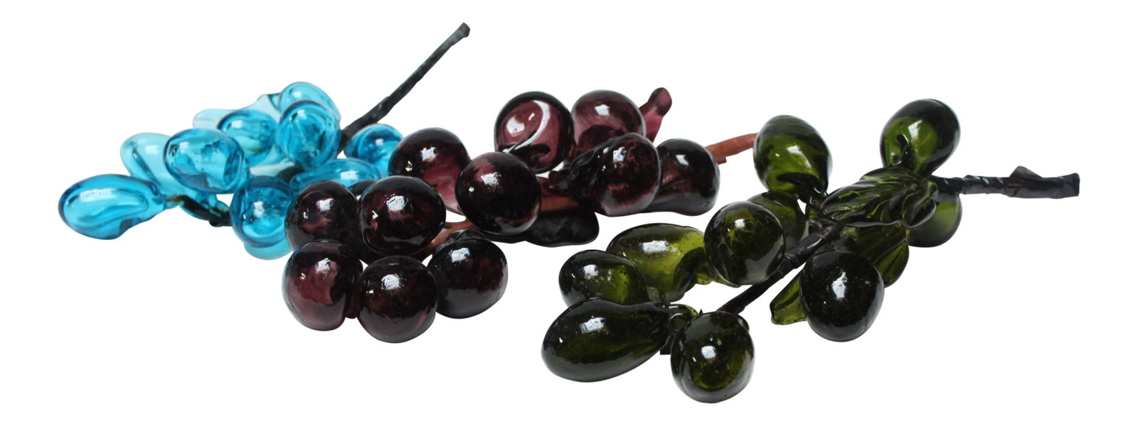 Set of Three Mid-Century Modern Blown Glass Grape Clusters: Colorful assortment of blown glass grape clusters: one in turquoise, one in purple, one in green with nice leaf and vine detail. Elegant decorative objects, ideally displayed loosely on a tabletop or