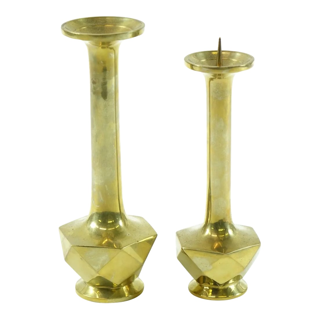 Mid 20th Century A Pair of Brass Candle Holders: A Pair of Brass Candle Holders Condition: Alterations: Original Condition Unaltered Imperfections: Some Imperfections Condition Notes: Good condition Materials & Techniques: Brass International: