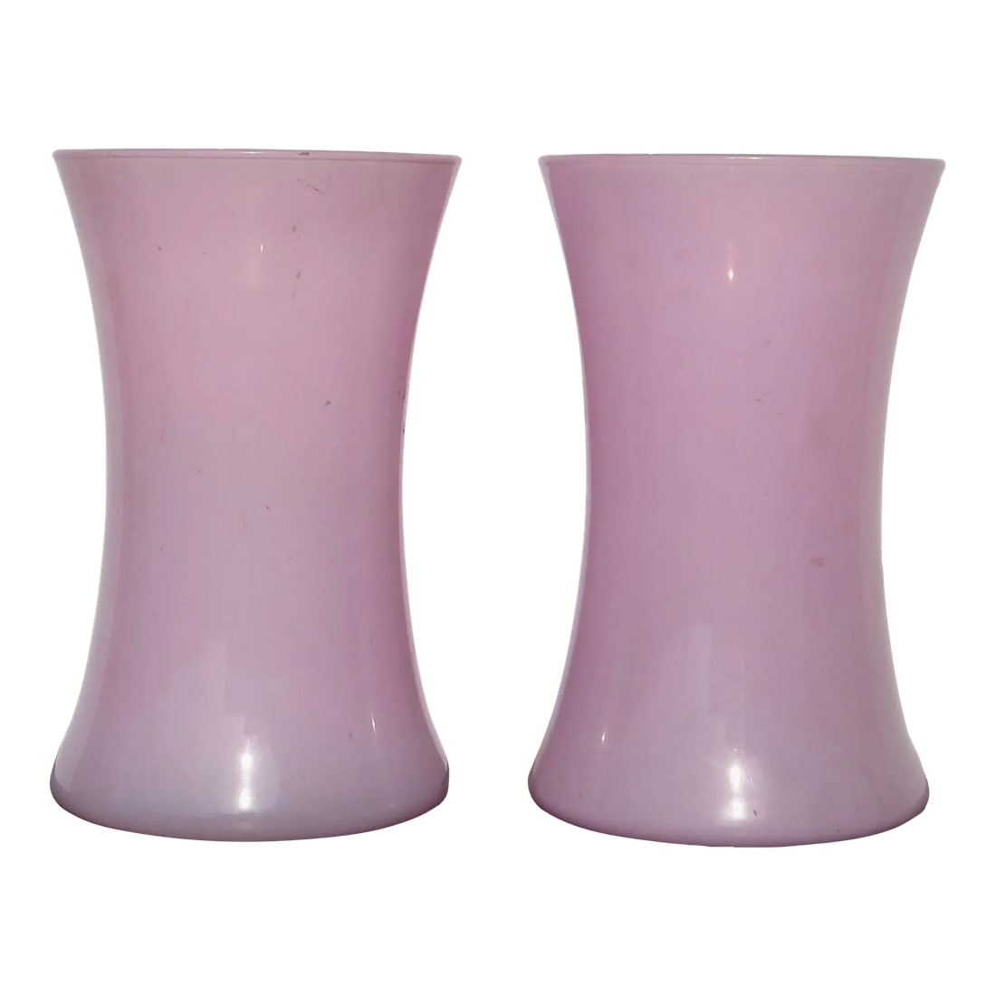 Pair of Pink Glass Vase - a Pair of 2: A pair of late 20th-century pink glass floral vases. Beautiful soft pink color with swept-in walls. Hand-formed shop glass with swirls in the bottom. The form allows the use of longer stems to be held
