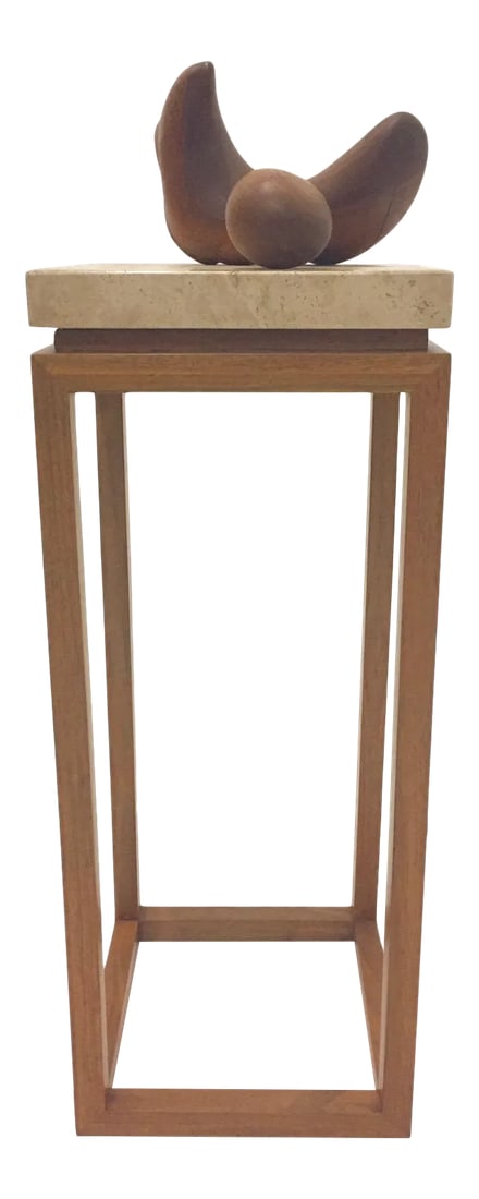 Abstract Walnut Sculpture on Travertine Base by Arthur Williams: A sophisticated freestanding sculpture signed by the renowned artist Arthur Williams, having two smooth walnut shapes placed on a lovely slab of travertine, floating on a superb walnut pedestal with
