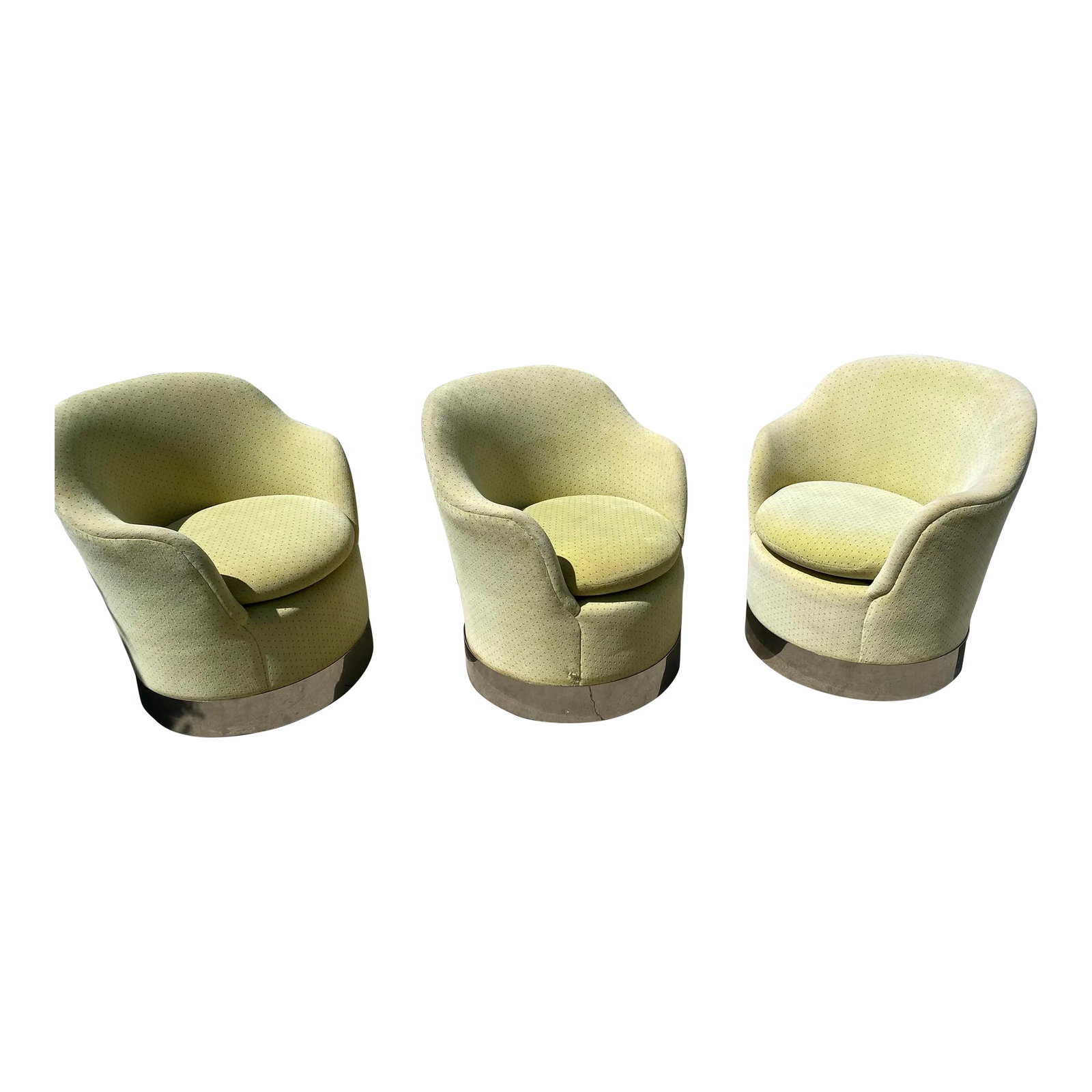Rare 1970s Space Age Swivel Chairs by Phillip Enfield Designs – Set of Three: Upgrade your space with this original set of three vintage 1970s space-age swivel chairs by Phillip Enfield Designs, New York. These stylish barrel/tub chairs sit on a sleek polished steel base with c