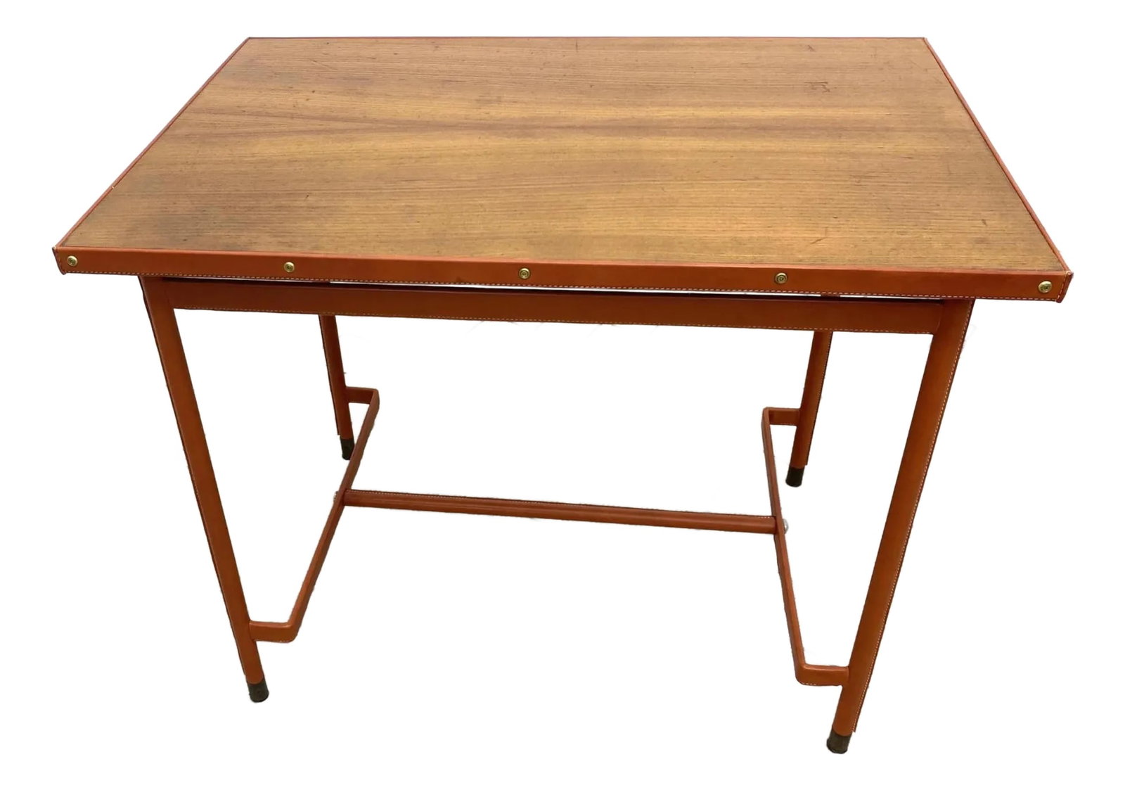 Midcentury French Leather Wrapped Writing Table Attributed to Jacques Adnet: Midcentury French leather-wrapped writing table / desk attributed to Jacques Adnet (unmarked). Iron base and frame around the wood top are wrapped in cognac leather with contract stitching and brass f