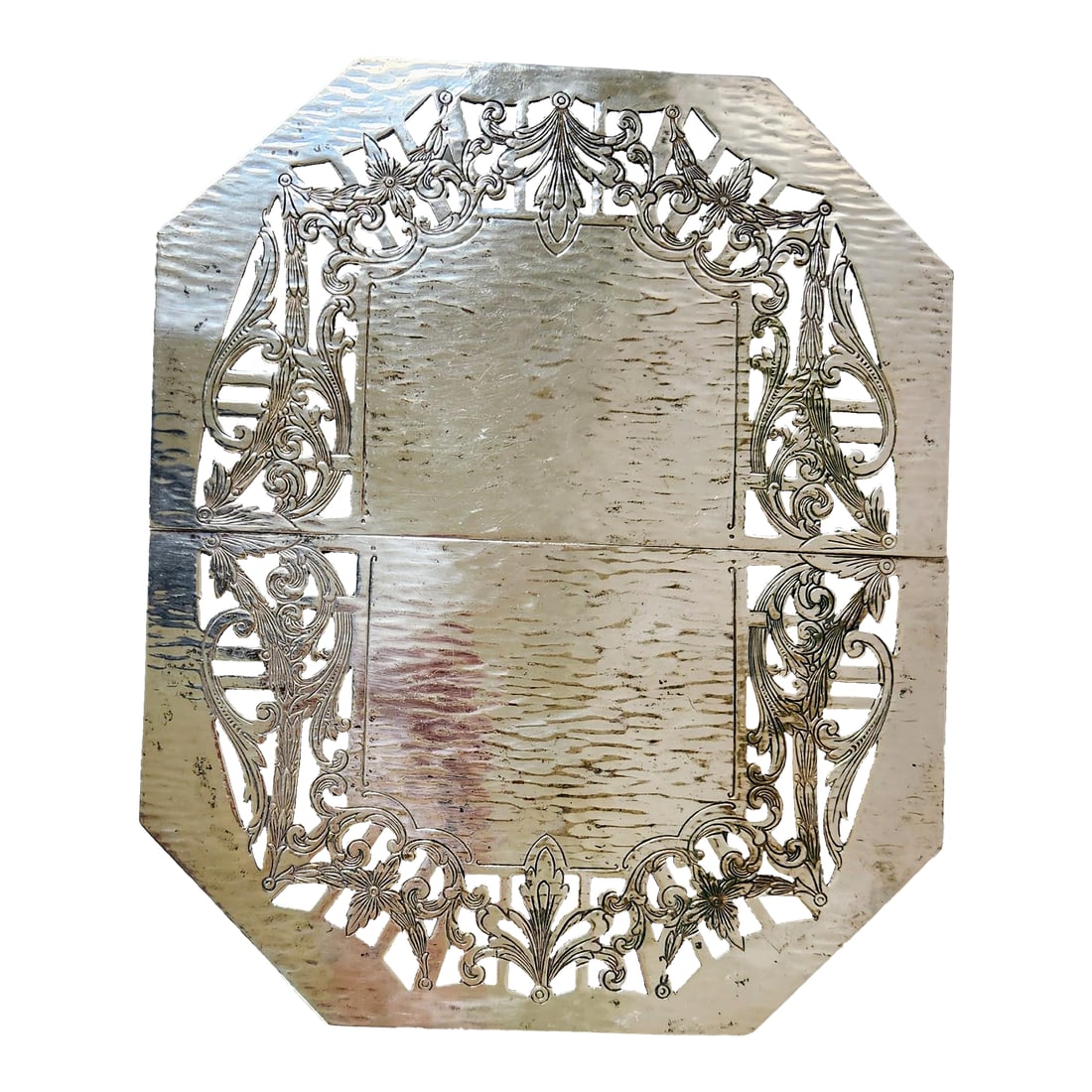 Late 19th Century Ornate Victorian Silverplate Expandable Trivet by the Middletown Silverware Compan: This is a beautiful and ornate example of a late 19th-century silver-plated expandable trivet by the Middletown Silverware Company. Here's a more detailed analysis based on its history: Hallmark