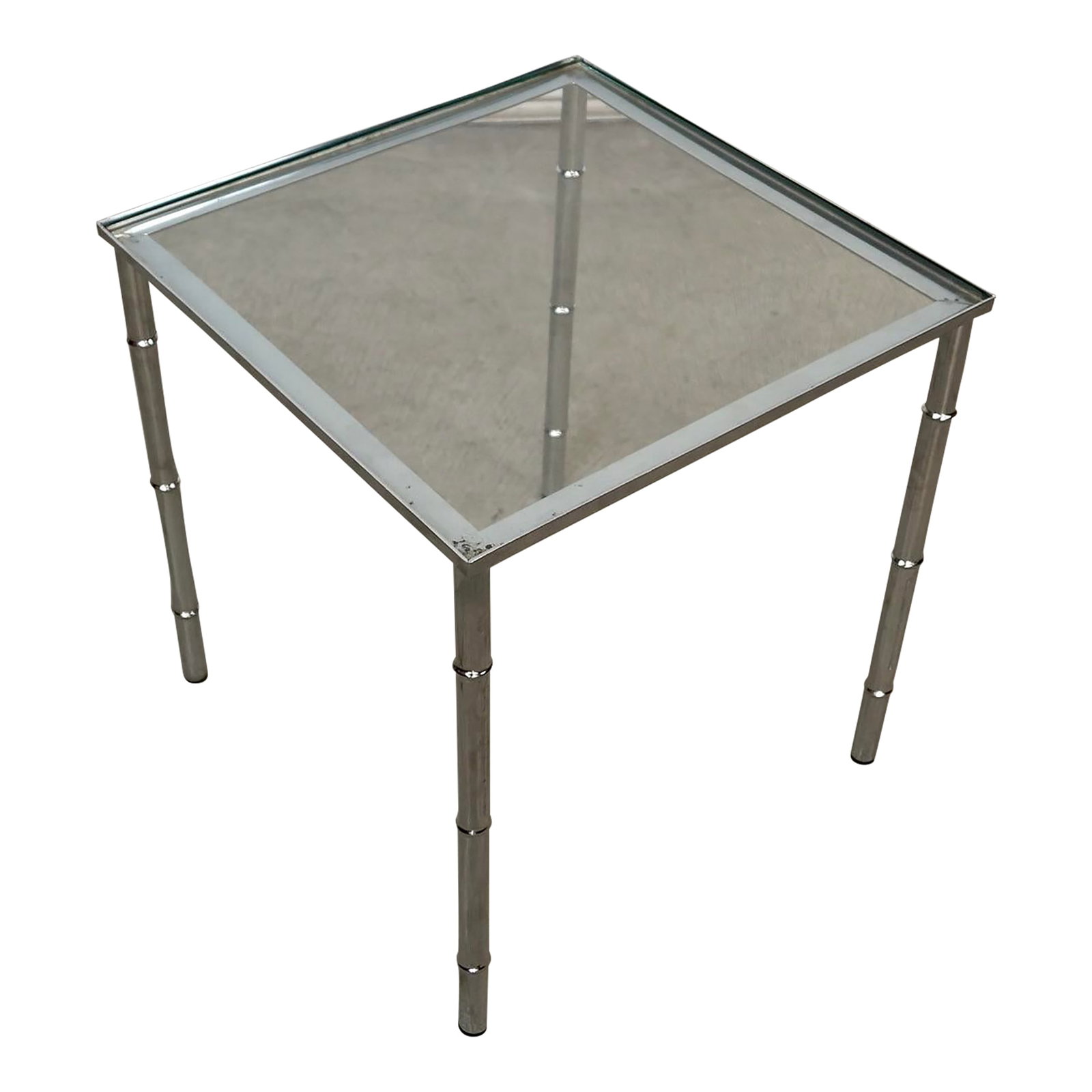 1970's Mid-Century Modern Italian Faux Bamboo Chrome Side Table: Vintage 1970's Mid century Modern end table for sale. Manufactured in Italy, and still has the original tag underneath. It's a great size, and has four faux bamboo legs with a glass insert top. The