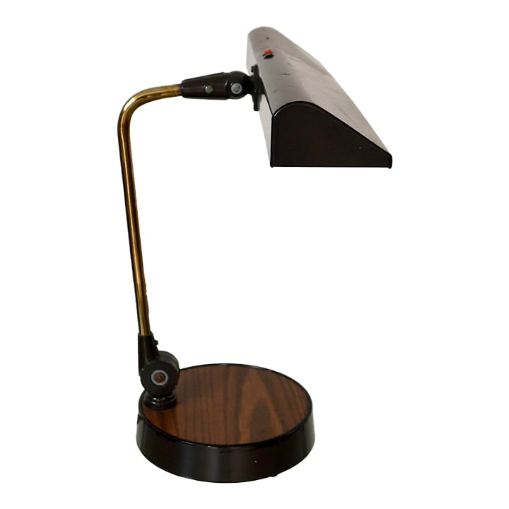 1970's Mid-Century Modern Executive Desk Lamp: Vintage Midcentury Modern desk lamp for sale. Manufactured in the 1970's by Art Specialty Inc, and in great original condition. It has a metal base with a formica faux wood top. It's brown with an adj
