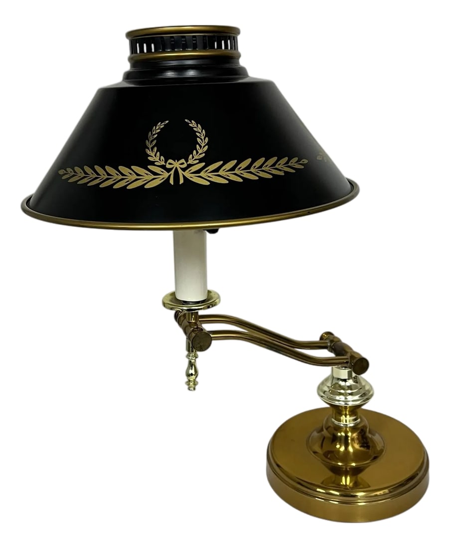 Vintage Tole Shade Student Desk Lamp: Vintage tole shade student desk lamp. Has the ability to move into multiple positions for best lighting on your project. Shade has the design all the way around. Measures in bent position base 6.5"