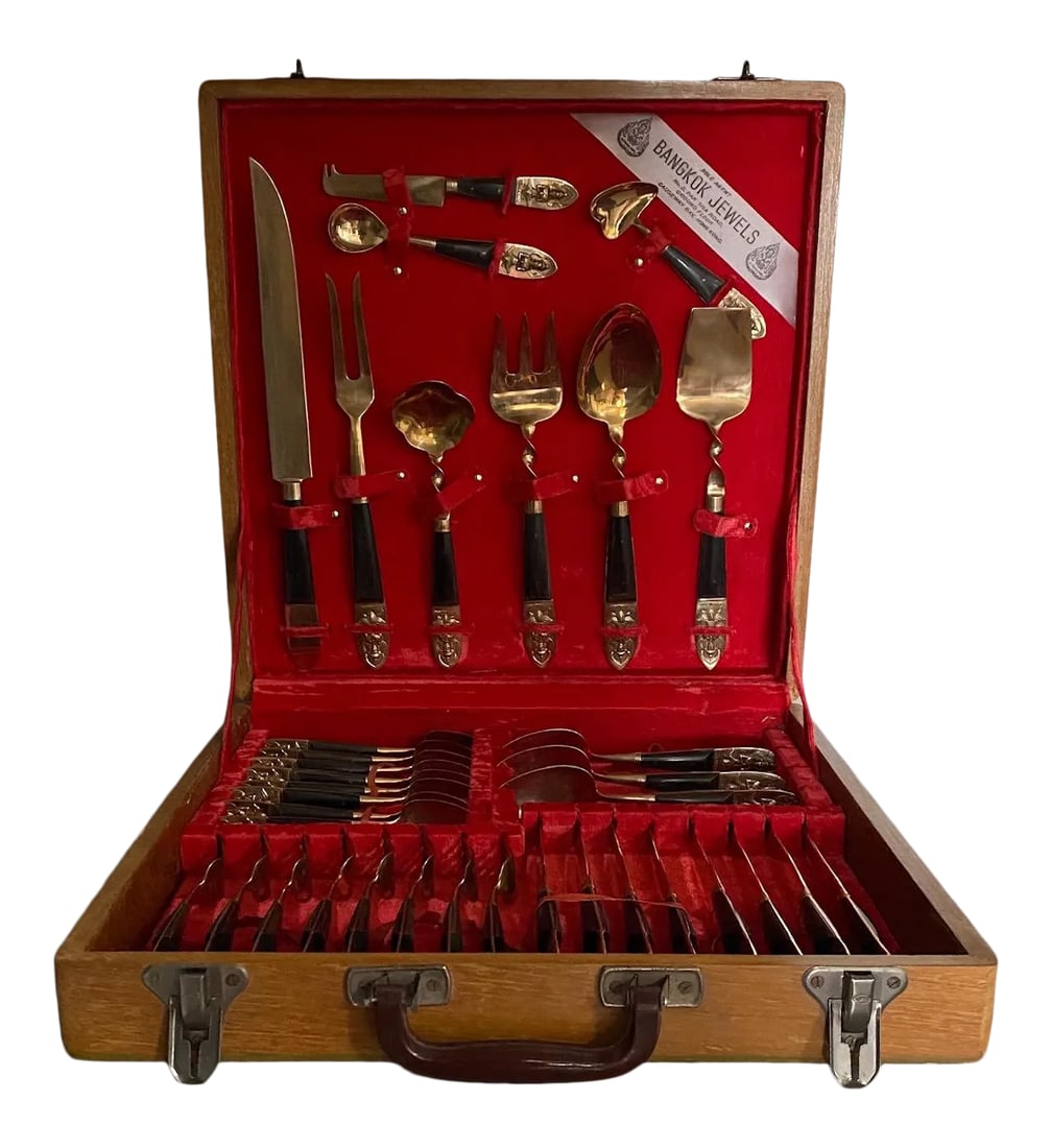 Vintage James Thailand Buddha Bronze Brass Flatware Set- 36 Pieces: Vintage mid-century modern James Thailand 36 piece flatware set with bronze seated Buddha on base of each piece. Handles are ebonized wood. Set includes eight forks, spoons, knives each; three serving