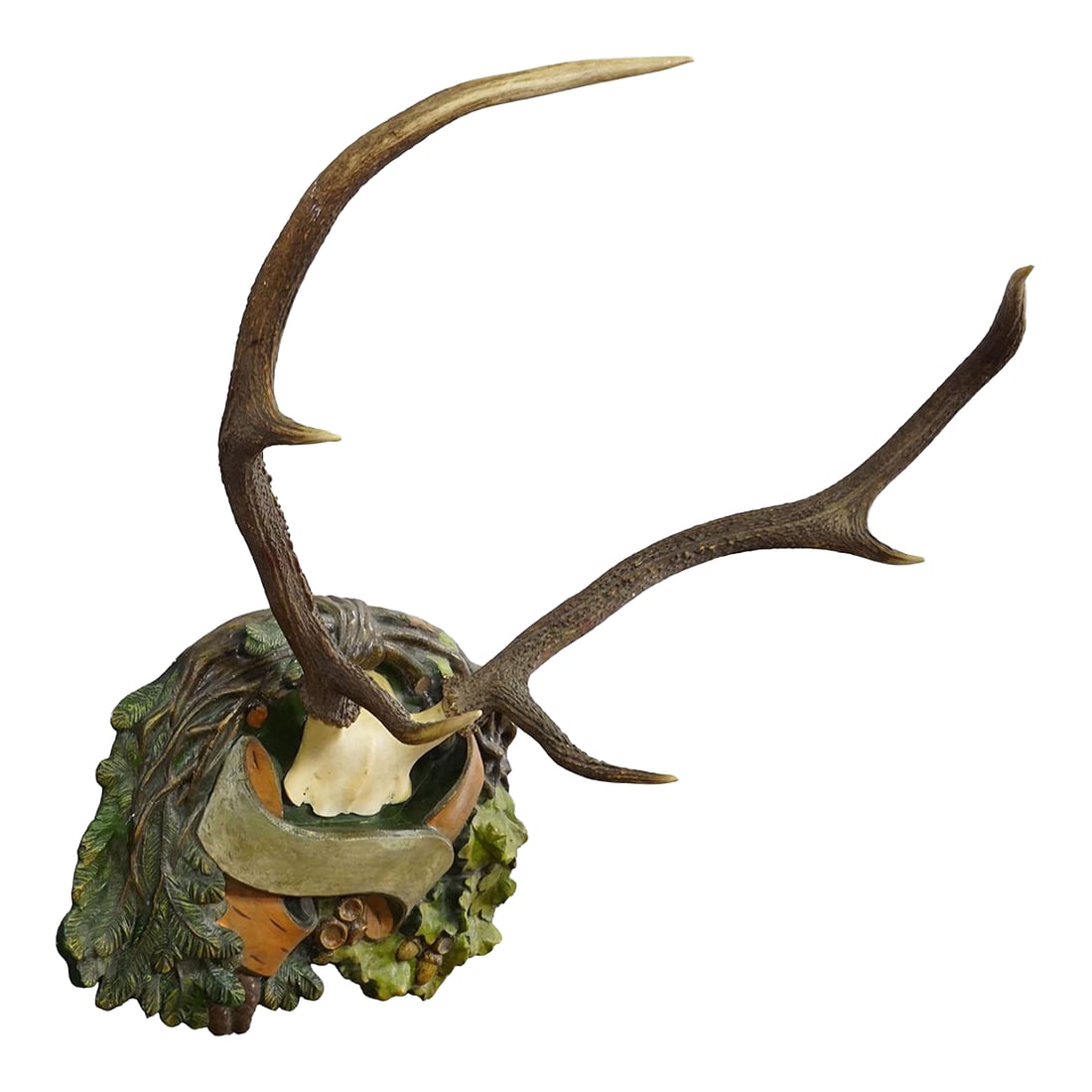 Antique Black Forest Deer Trophy on Plaster Plaque, Ca. 1920s: Antique Black Forest Deer Trophy on Plaster Plaque, ca. 1920s This piece features a six-point red deer antler (Cervus elaphus) mount attached to an elaborately designed plaster plaque. The plaque is