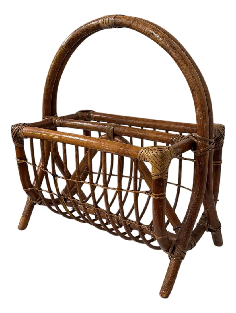 Vintage Bent Bamboo and Rattan Magazine Media Rack: This vintage magazine rack is crafted from bent bamboo and rattan, often designed in a boho, coastal, or mid-century modern style. Purpose: Typically used for storing magazines, books, laptops, tablet