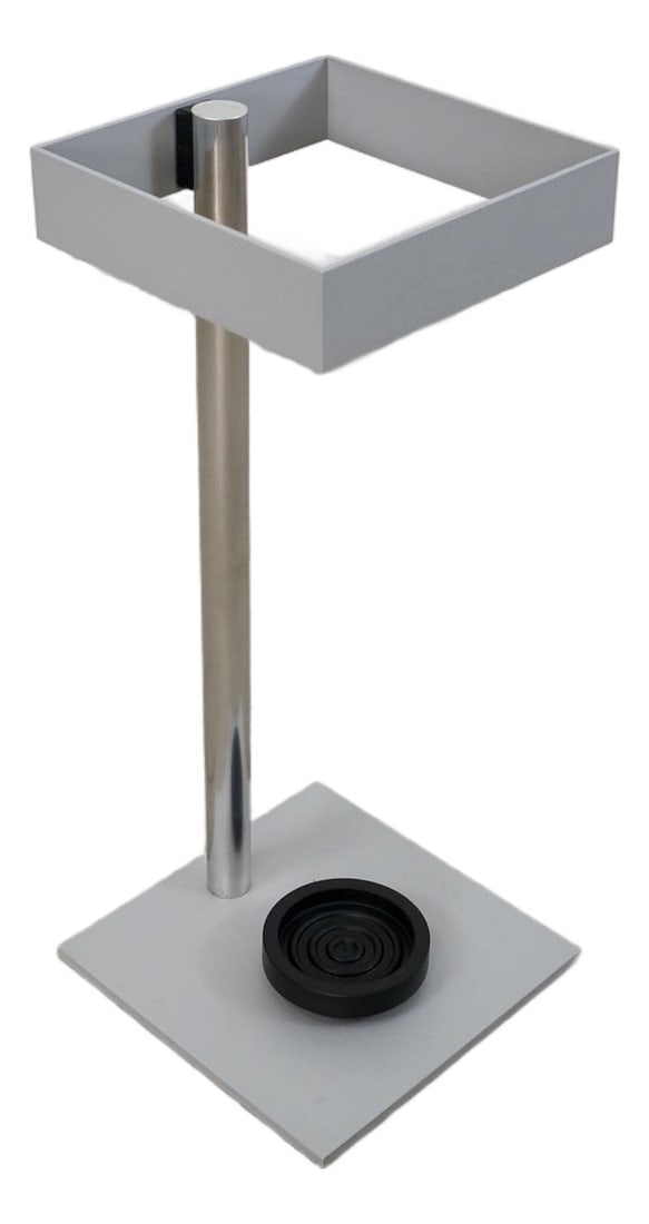 Postmodern Swiss Buro Umbrella Stand: Amazing Post Modern umbrella stand for sale. This is a designer stand by Bruno Helbling, and is called the Cascando Standin. It's very architectural, and has a sleek and clean design. It's made of