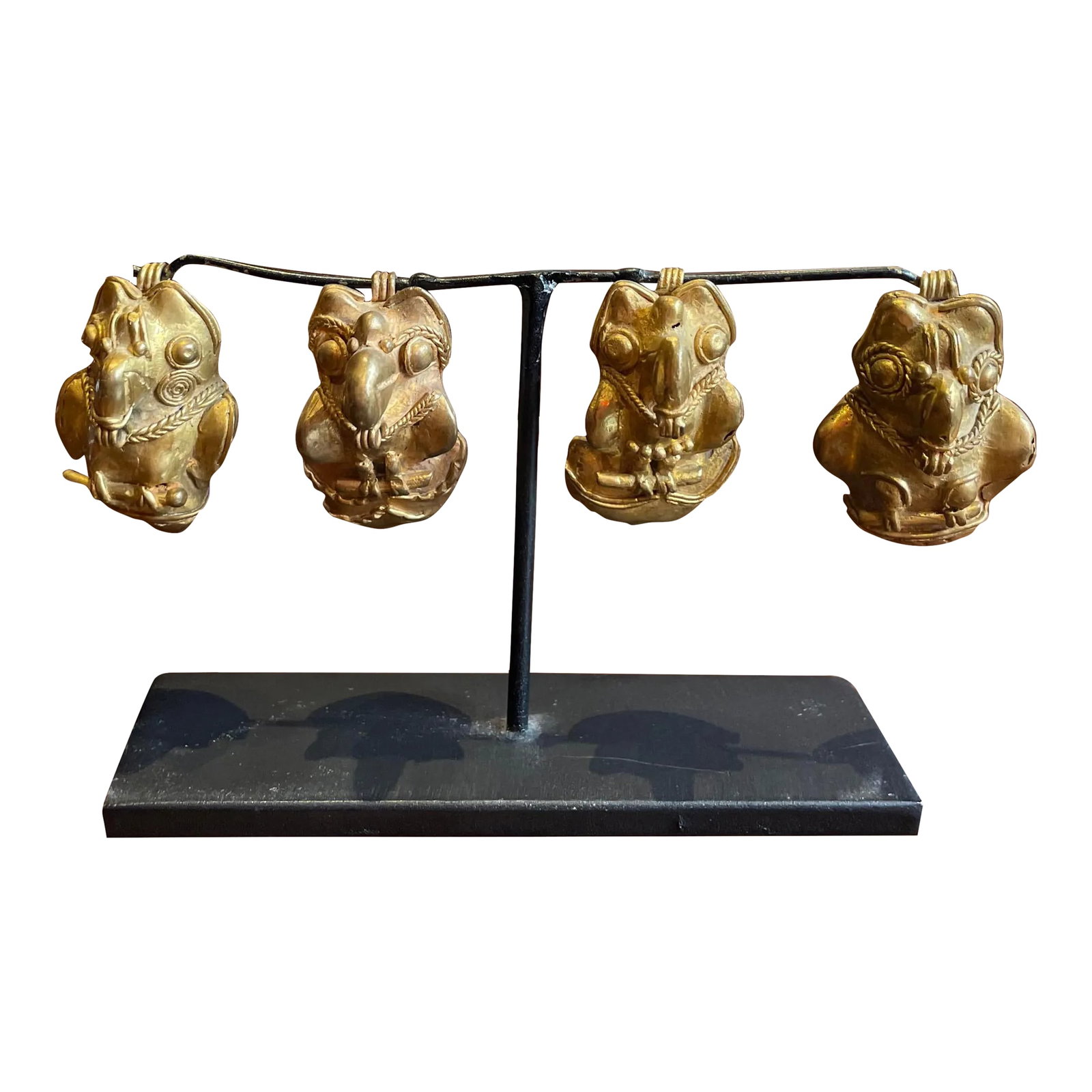 Antique Costa Rican Tumbaga Bird Pendant Sculpture: Darling sculpture comprised of Pre-Columbian tumbaga owls, from west coast of Central America, Costa Rica/Panama, ca. 700-1500 AD. A set of four depletion gilded tumbaga owls, each perched upon a