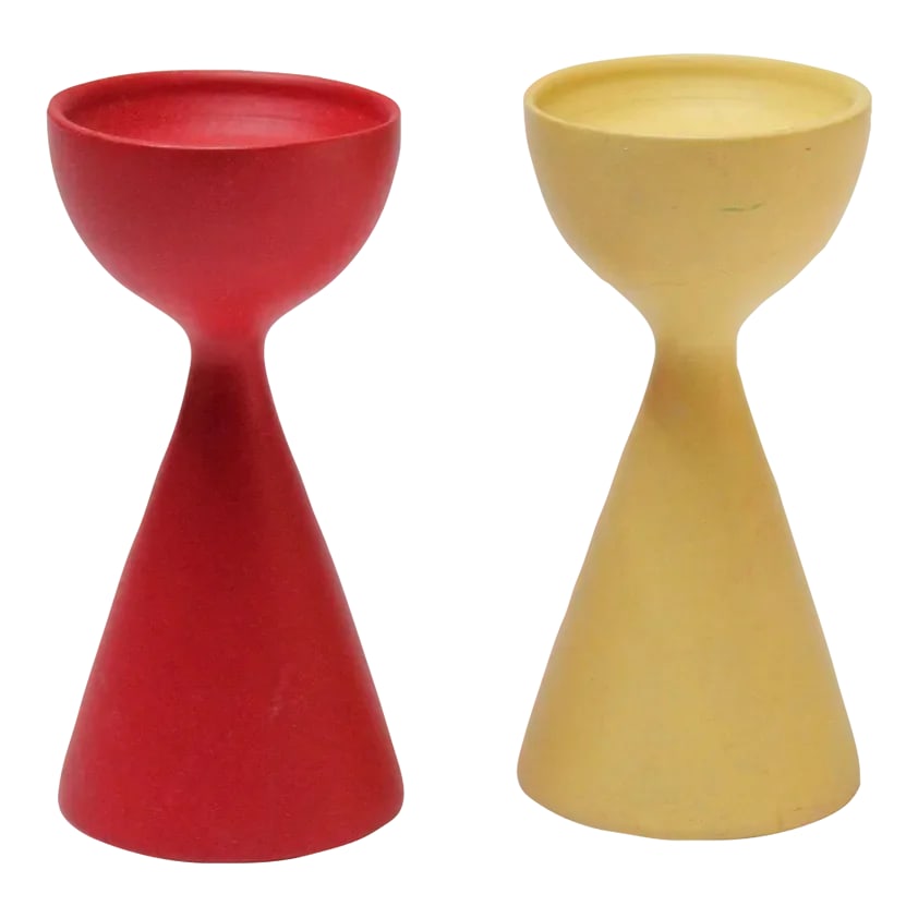 Petite Set of Two Danish Modern Sculptural Candlesticks: Small Danish Modern Candlesticks, one in yellow, one in red, with deeply sculpted forms. Paint shows some scuffs in places, but the set presents well. Petite size: H: 3.75" x D: 1.75" Condition: