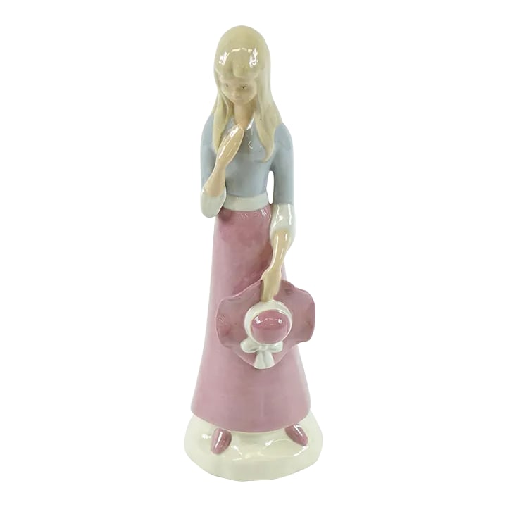 Mid 20th Century European Porcelain Figurine of a Girl: Delicate European Porcelain Figurine of a Girl. Circa Mid 20th Century. Condition: Alterations: Original Condition Unaltered Imperfections: Some Imperfections Condition Notes: Great Overall