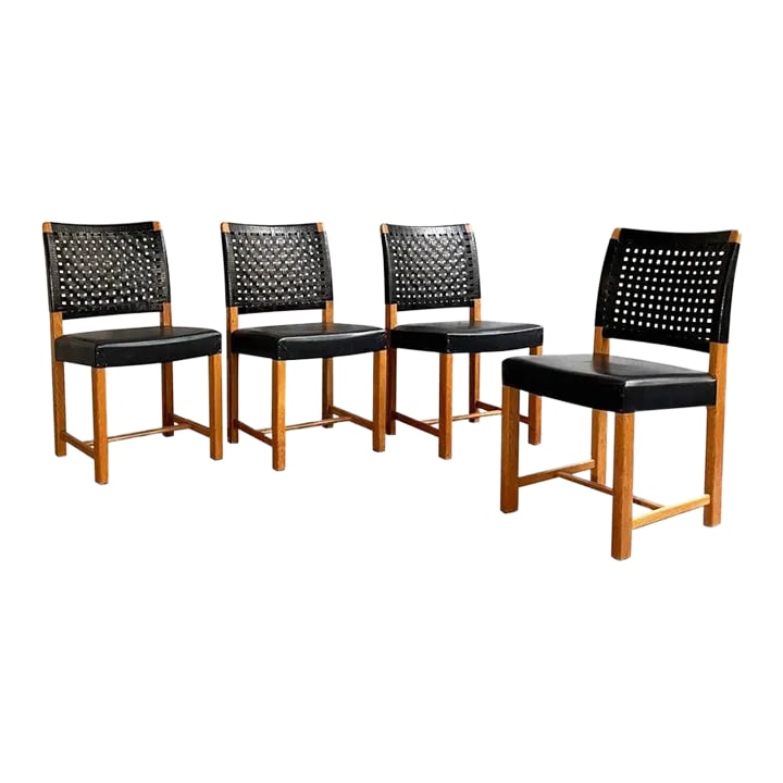 1960s Swedish Mid-Century Modern Black Woven Leather Dining Chairs - Set of 4: Set of four side dining chairs feature black woven leather backs with black leather seats. Condition: Alterations: Restored Imperfections: Some Imperfections Condition Notes: The frames have been refi