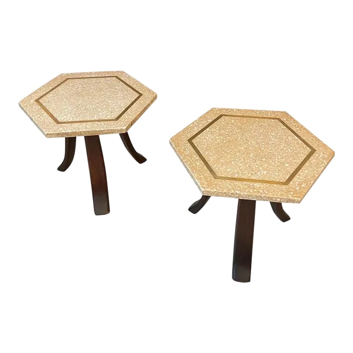 1960s Pair of Harvey Probber Hexagonal Terrazzo Side Tables: Pair of mid-century modern, Moroccan influenced, side/end tables by Harvey Probber feature hexagonal shaped, terrazzo stone tops with brass inlay on three sloping mahogany legs. The terrazzo tops are 