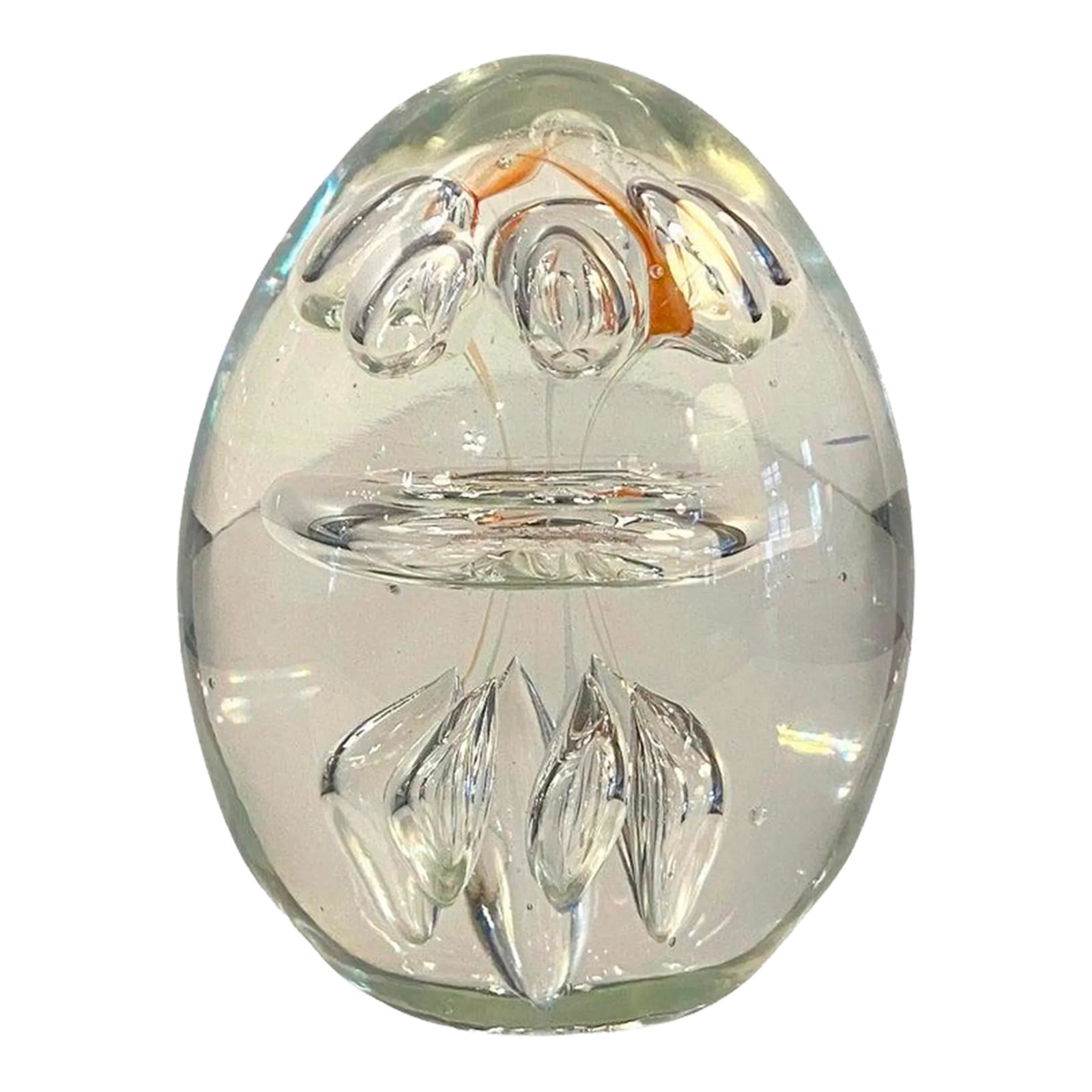 1980s Clear Hand Blown Art Glass Paperweight: Hand-blown, clear, oblong, art glass paperweight features a clear hand-blown center ring with several controlled bubbles atop and below with the faintest hints of orange dash around the top.