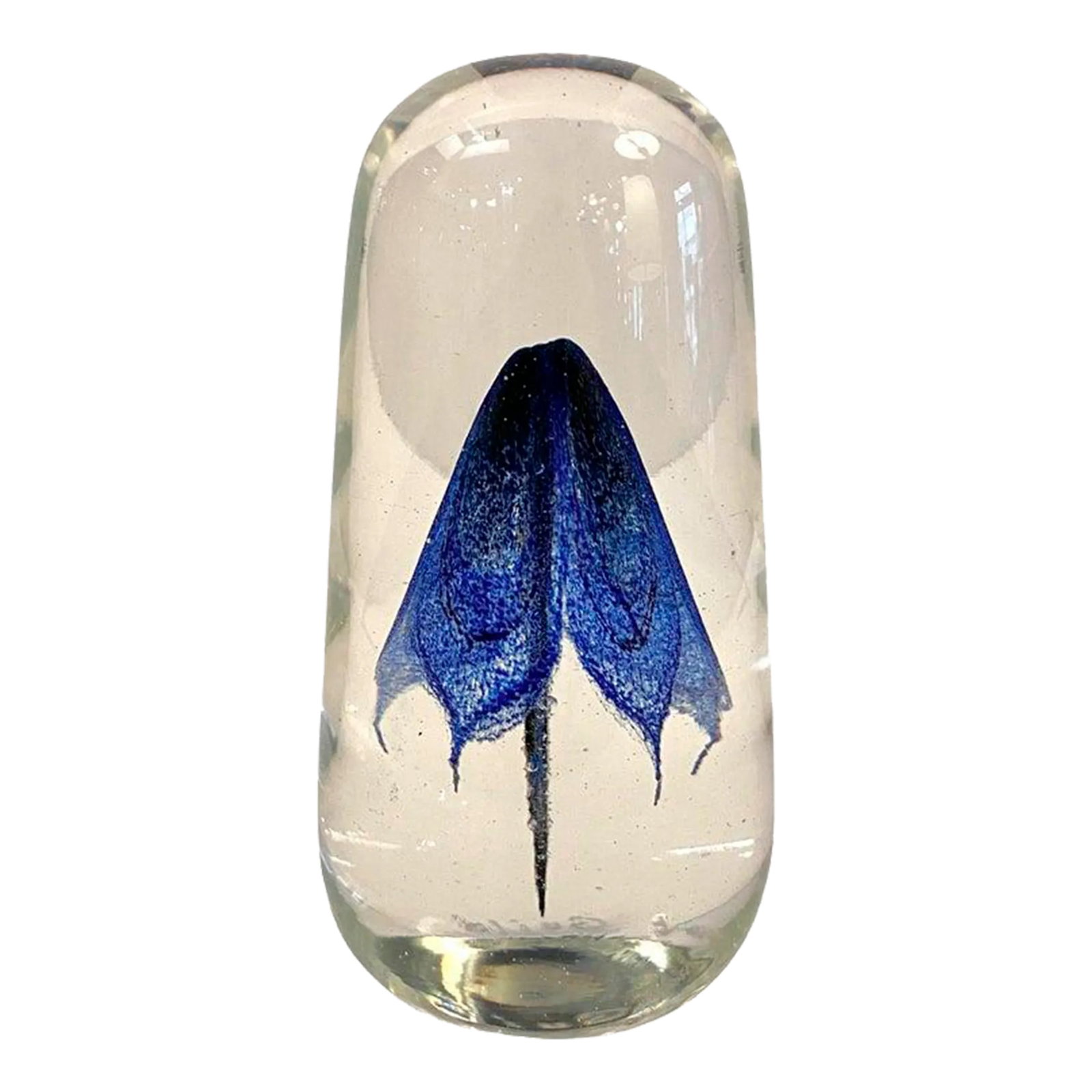 1980s Tall Art Glass Blue Swirl Jellyfish Paperweight: Artisan-made, hand-blown, art glass paperweight by Rochester Folk Art Guild features a graceful, cobalt blue form resembling a jellyfish or a flower encased in a clear glass tall oblong shape that