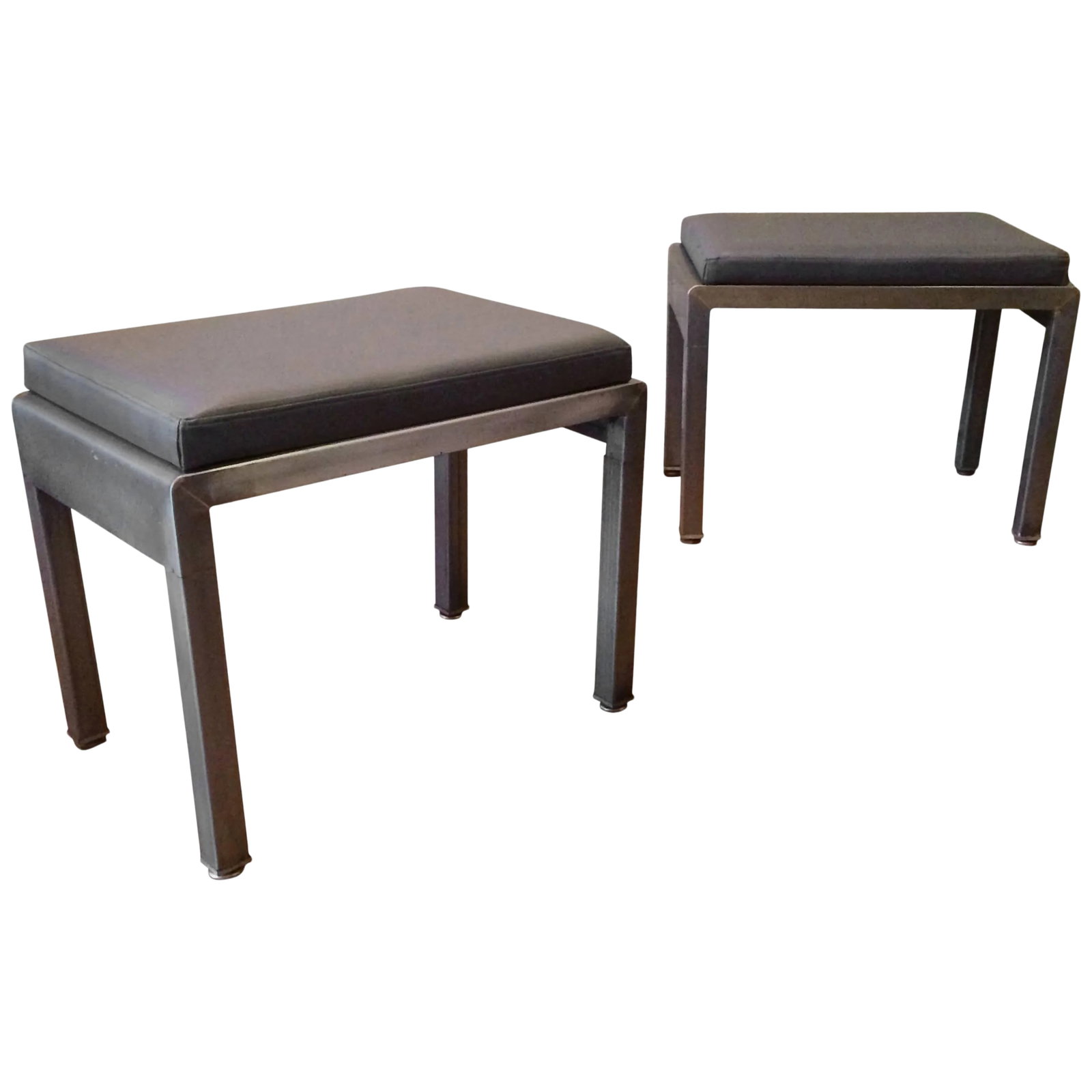 1930s Vintage Norman Bel Geddes for Simmons Art Deco Ottomans- A Pair: Pair of Art Deco ottomans or stools by Norman Bel Geddes for Simmons furniture company are brushed steel with newly upholstered vinyl tops. Condition: Alterations: Restored Imperfections: Some Imperfe