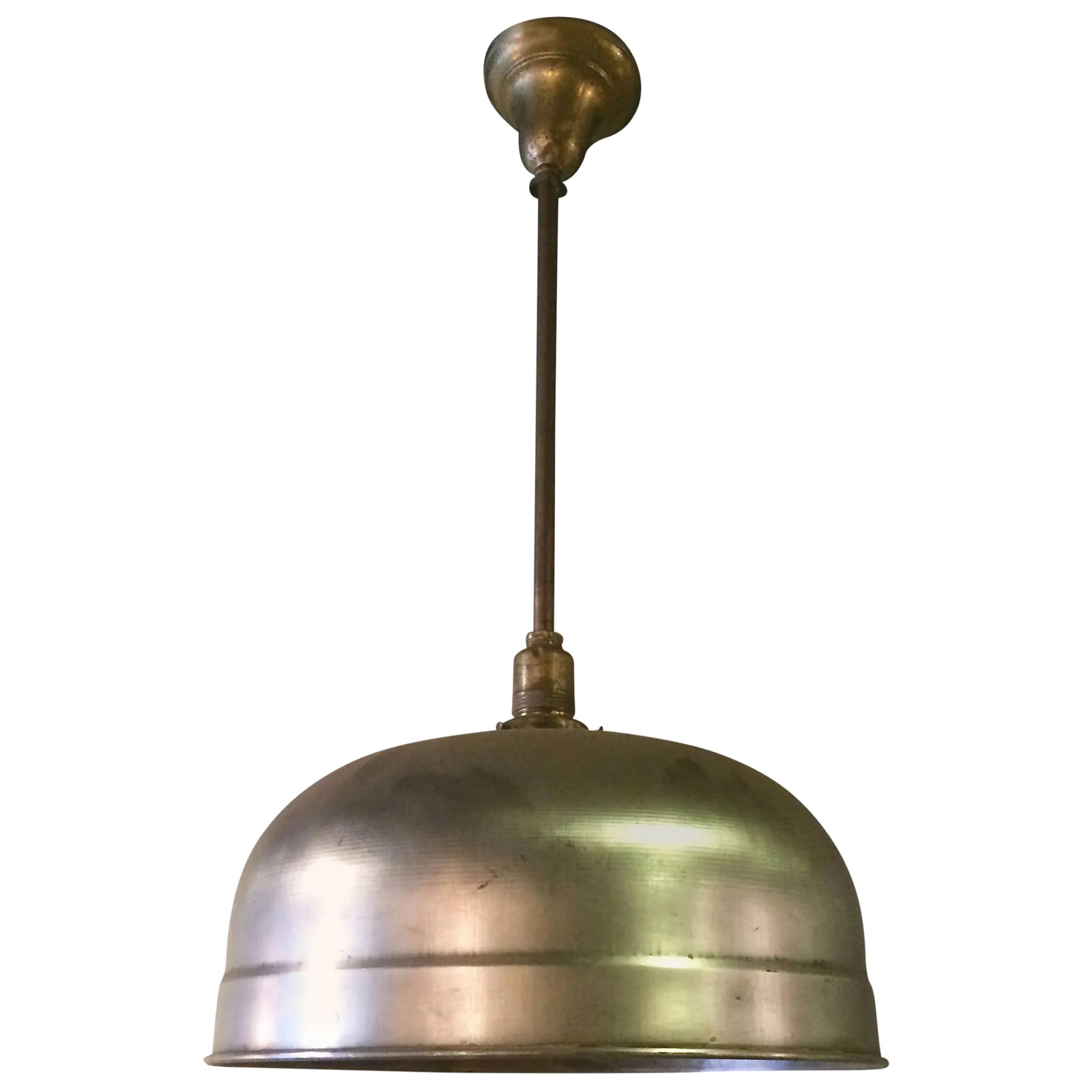 1940s Industrial Brushed Steel Brunswick Dome Pendant Light: Industrial, brushed steel pendant light by Brunswick Co. with dome shade on a pole with brass canopy. Newly wired to accept up to a 200 watt bulb. Condition: Alterations: Restored Imperfections: Some 