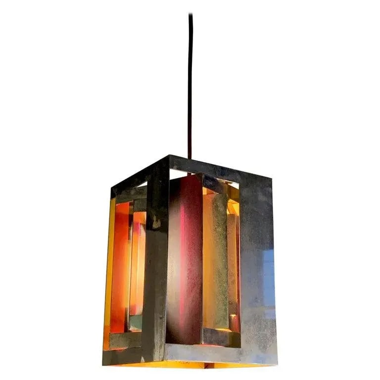Danish Modern Limited Edition "Kassablanka" Pendant Light by Simon Henningsen: Danish modern, limited-edition, "Kassablanka" pendant light by Simon Henningsen produced by Lyfa 1963-1965 features a labyrinthine of four interlocking cut-out chrome cubes with painted interiors