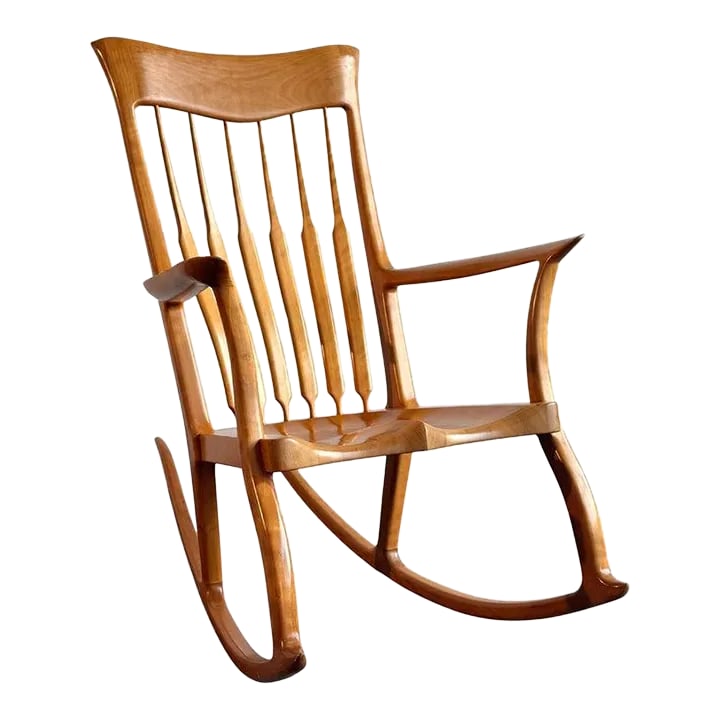 1990s Artisan-Made Spindle Back Rocking Chair in the Style of Sam Maloof: This stunning artisan-made rocking chair is hand-crafted in the style of acclaimed American furniture maker and woodworker Sam Maloof who is considered a central figure of the post-war American crafts