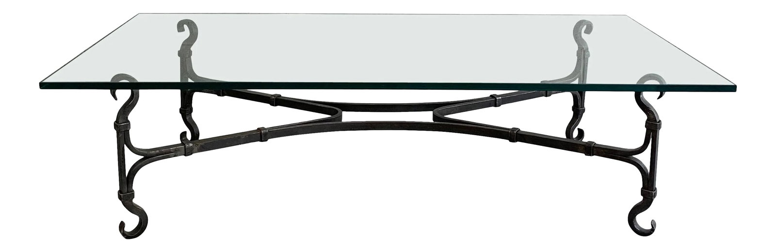 Gothic Artisan Handwrought Iron and Glass Coffee Table: Impressive, Gothic influenced, artisan blacksmith made, coffee table circa 1940s features a handwrought, iron x base with 3/4 inch thick glass top. Condition: Alterations: Original Design Modified Imp
